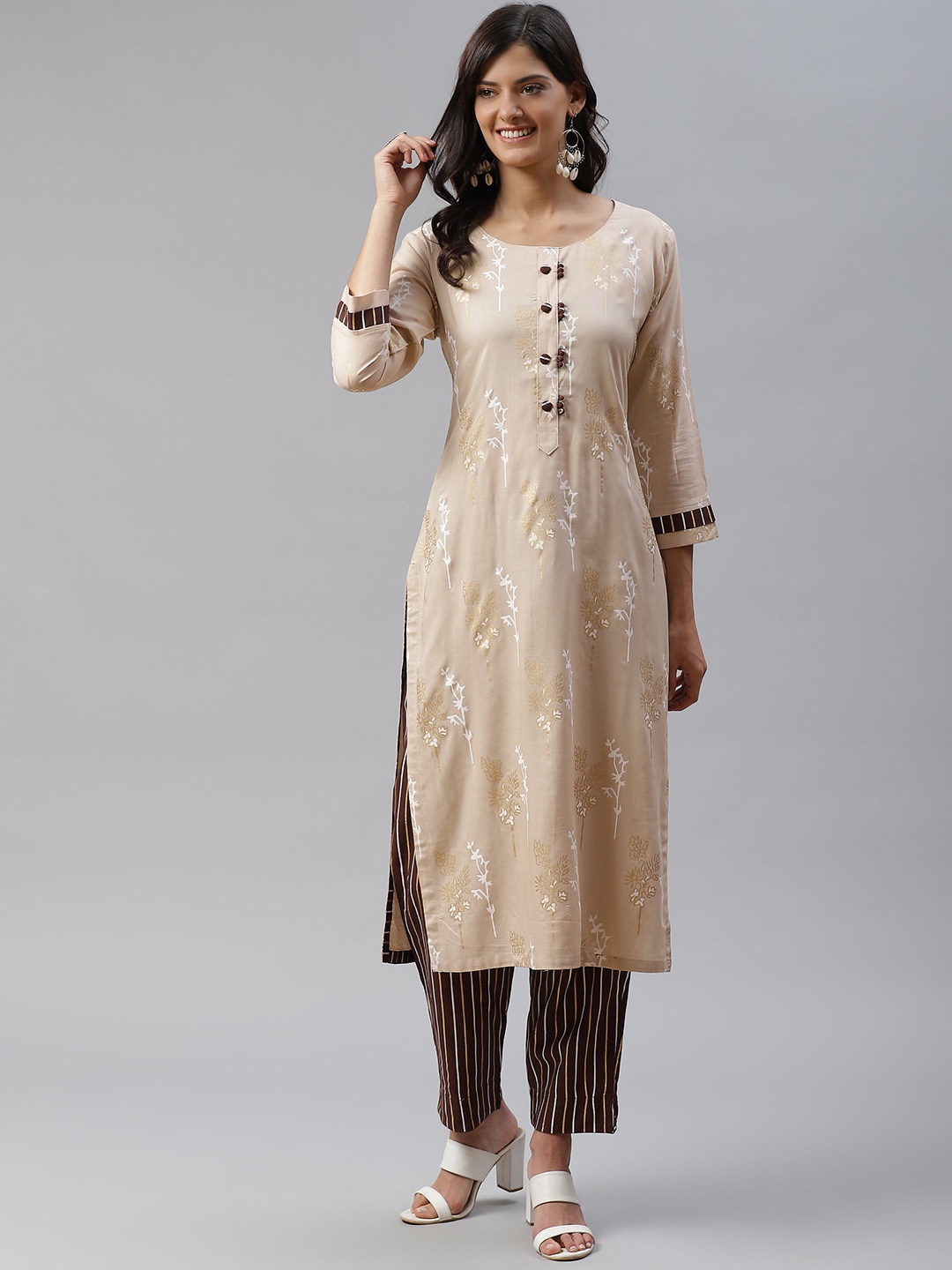 

HIGHLIGHT FASHION EXPORT Women Beige & White Foil Printed Kurta with Trousers