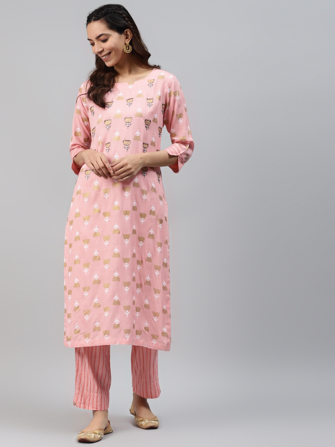

HIGHLIGHT FASHION EXPORT Women Pink & Golden Printed Kurta with Trousers