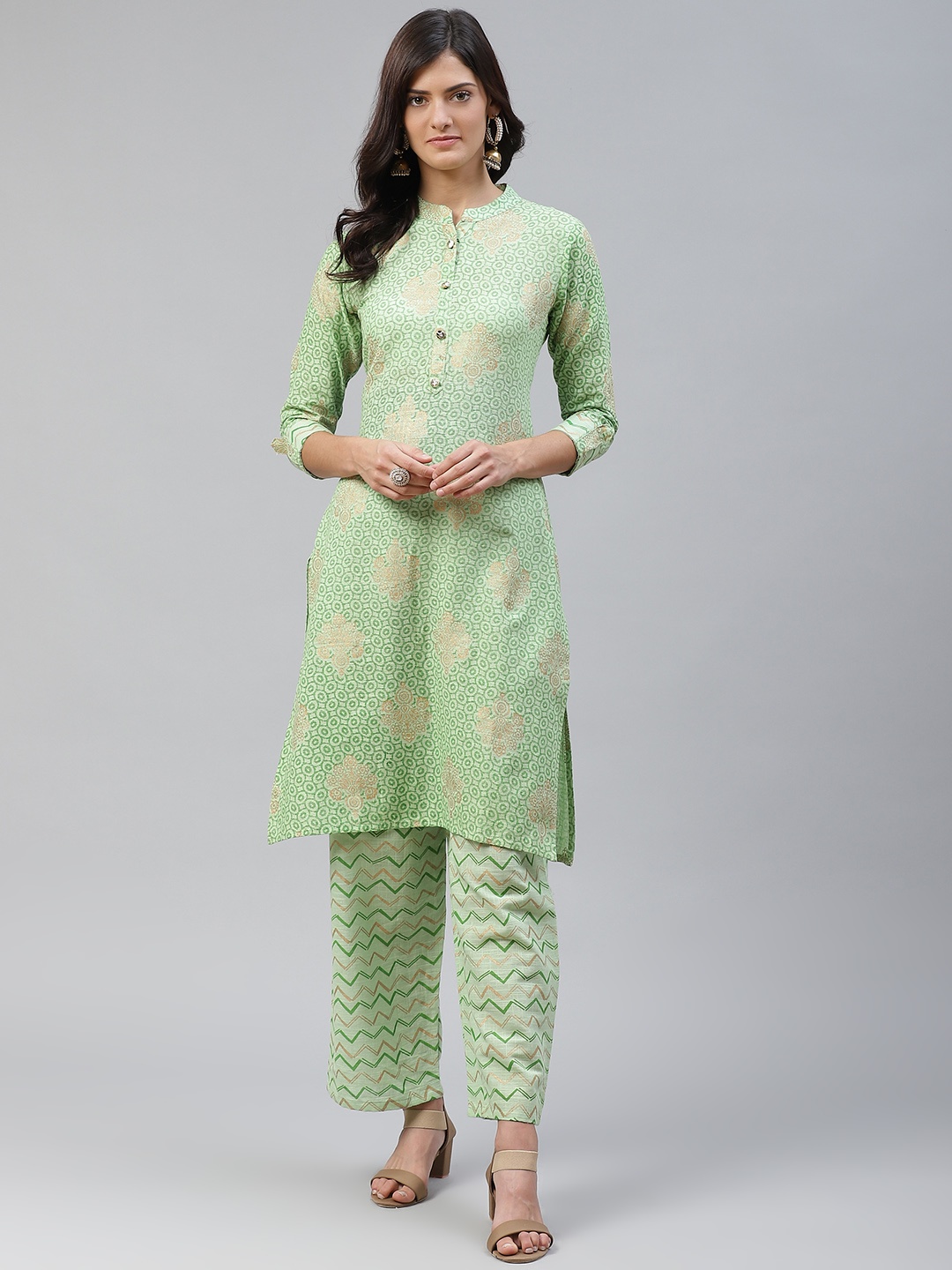

HIGHLIGHT FASHION EXPORT Women Green & Gold-Toned Printed Kurta with Trousers