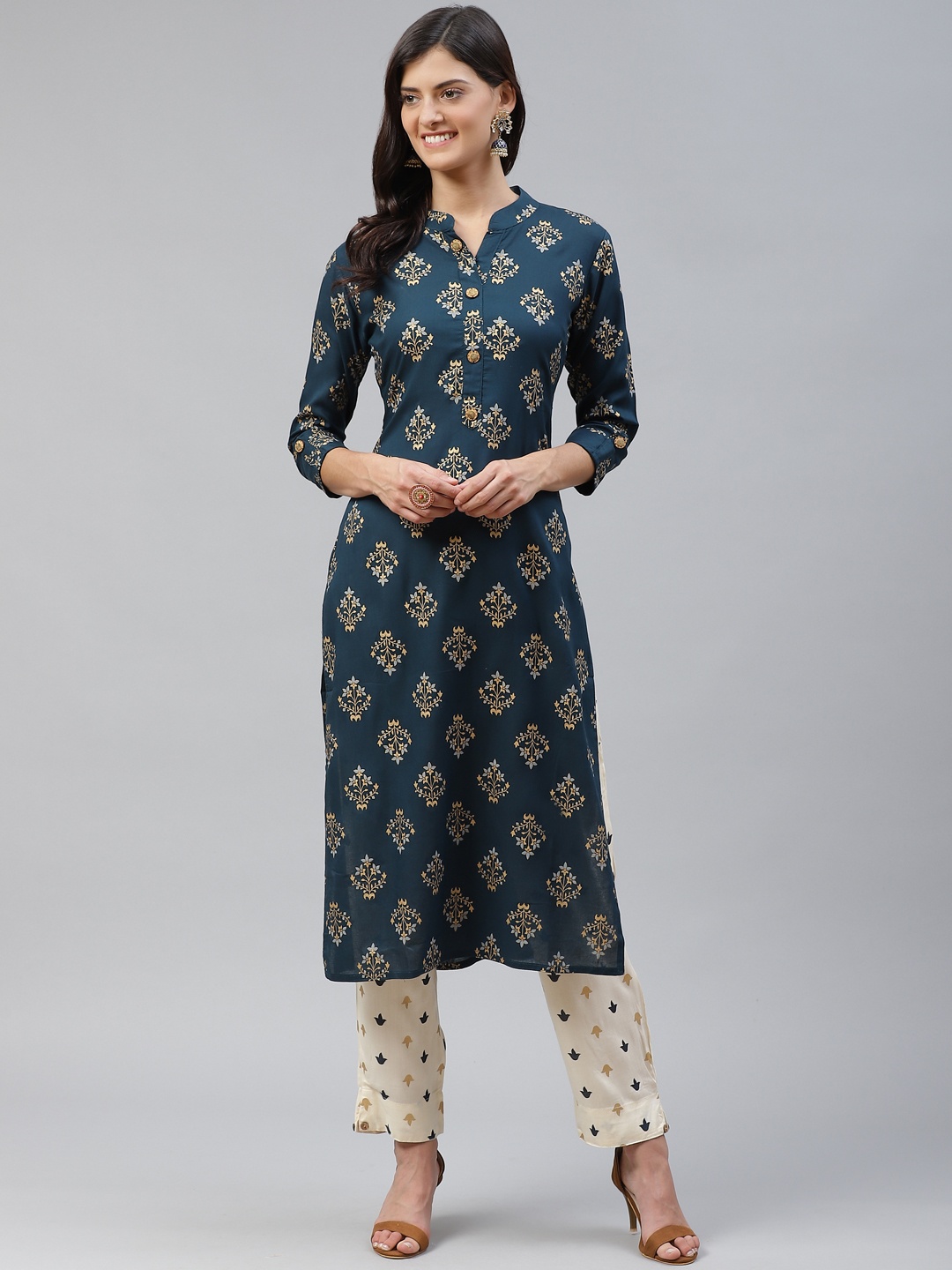 

HIGHLIGHT FASHION EXPORT Women Teal Blue & Golden Printed Kurta with Trousers