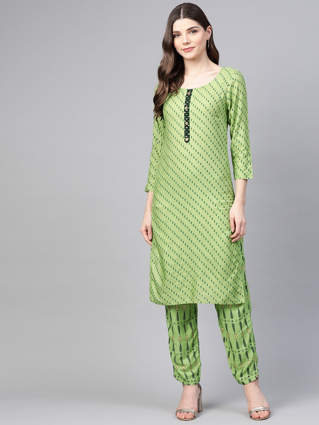 

HIGHLIGHT FASHION EXPORT Women Green & Golden Printed Kurta with Trousers