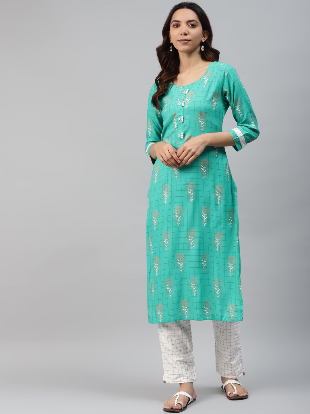 

HIGHLIGHT FASHION EXPORT Women Green & Off-White Printed Kurta with Trousers