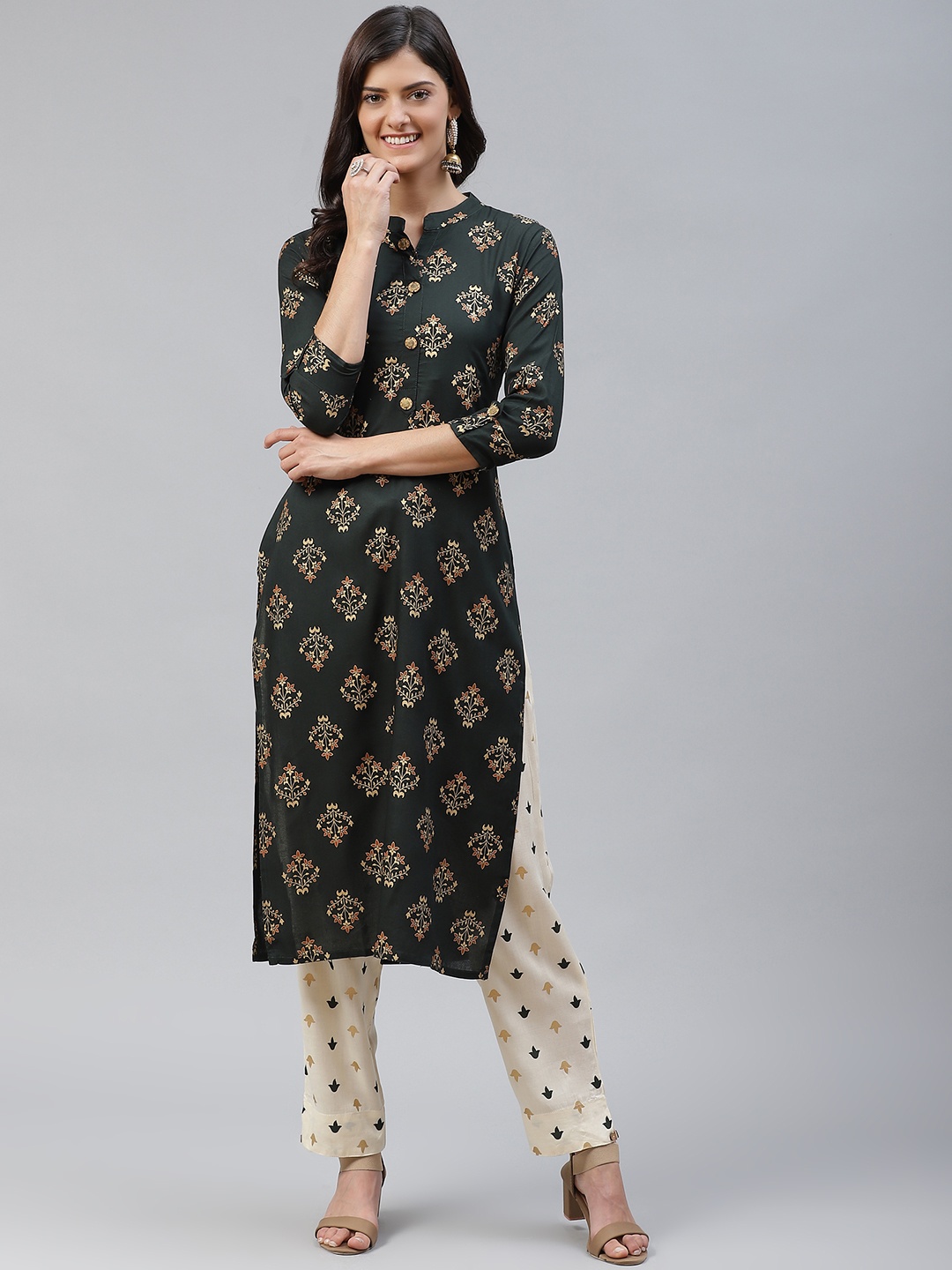 

HIGHLIGHT FASHION EXPORT Women Green & Golden Printed Kurta with Trousers