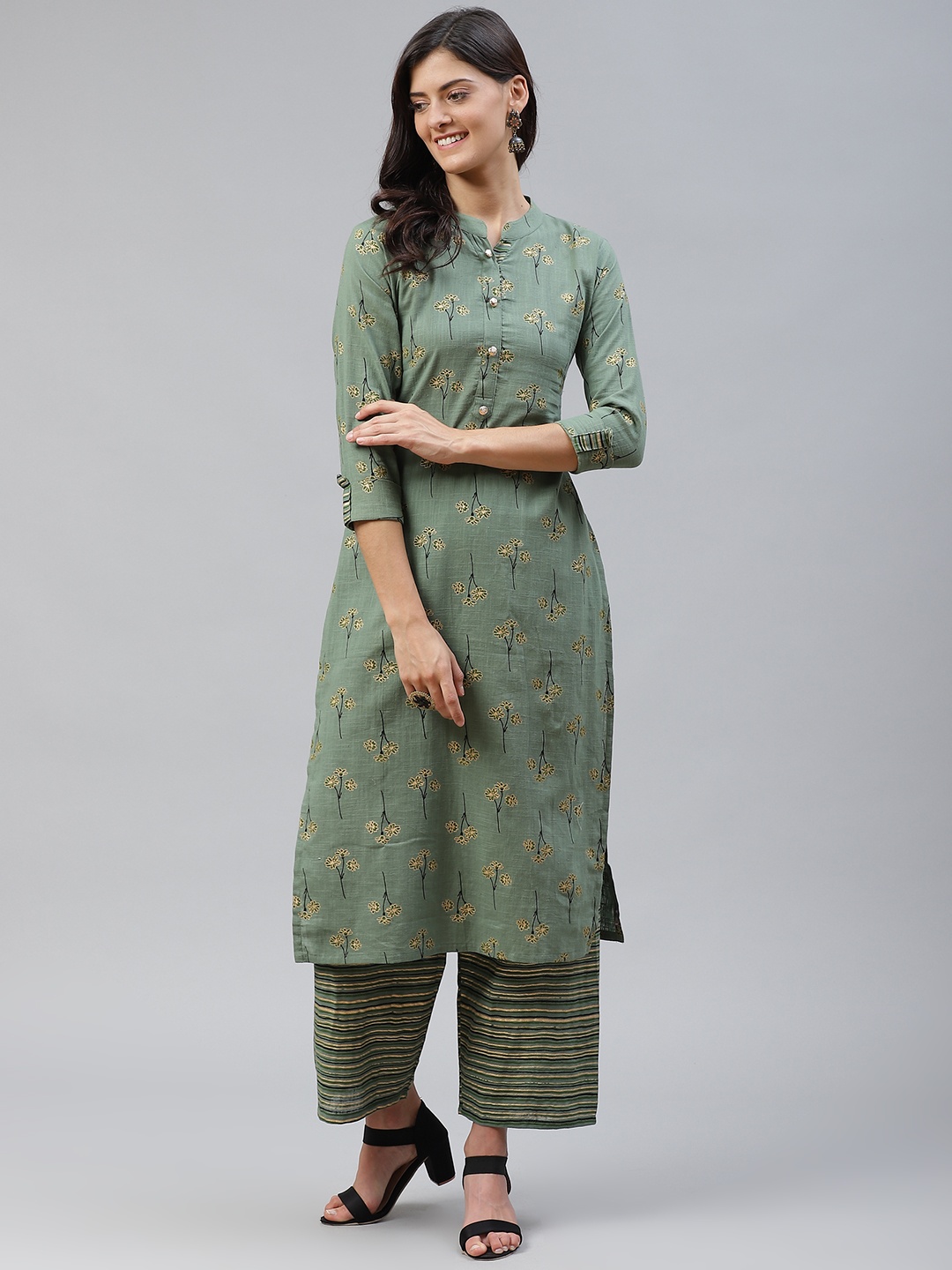 

HIGHLIGHT FASHION EXPORT Women Green & Black Foil Floral Printed Kurta with Palazzos