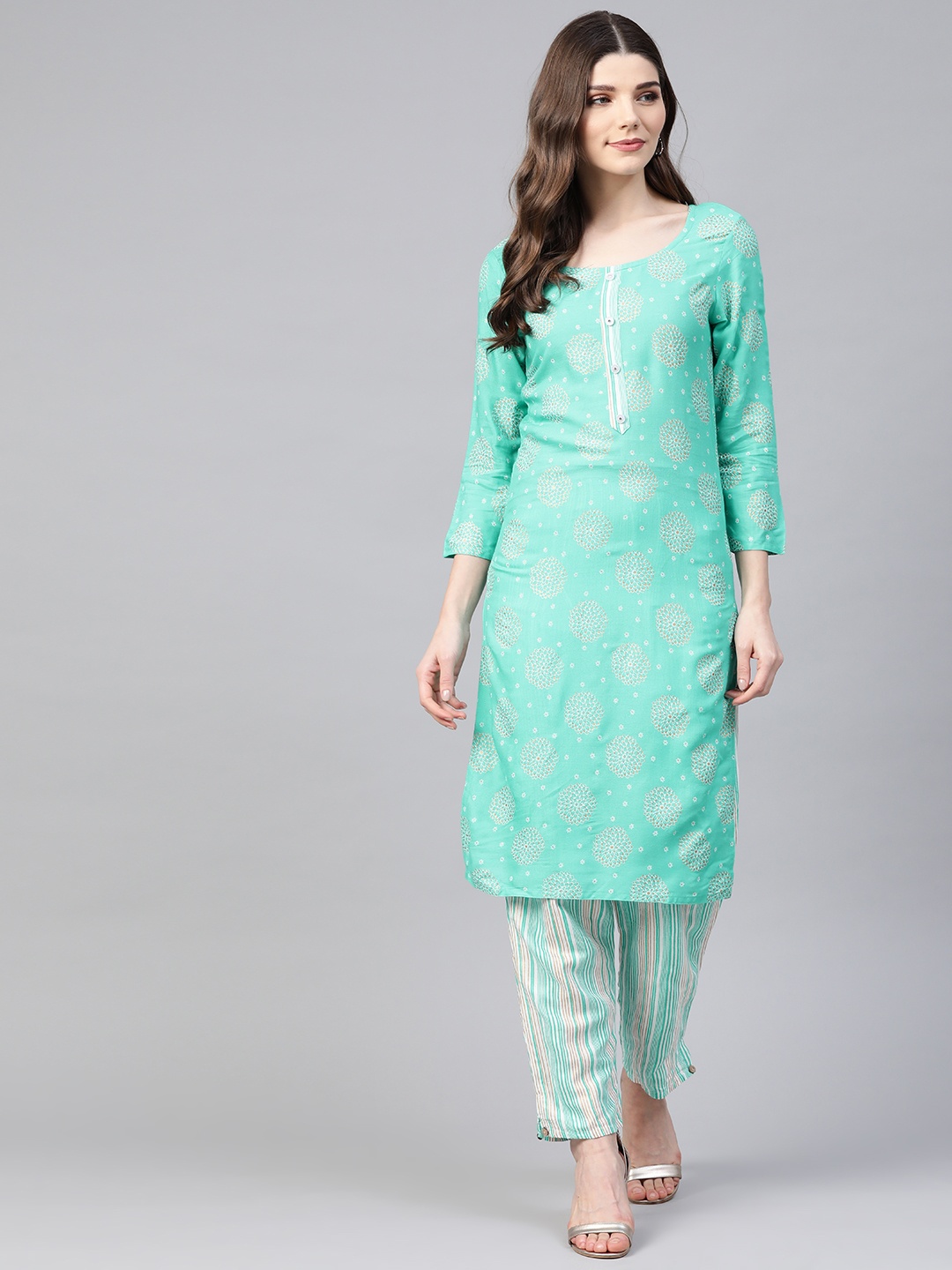 

HIGHLIGHT FASHION EXPORT Women Sea Green & White Foil Print Kurta with Trousers