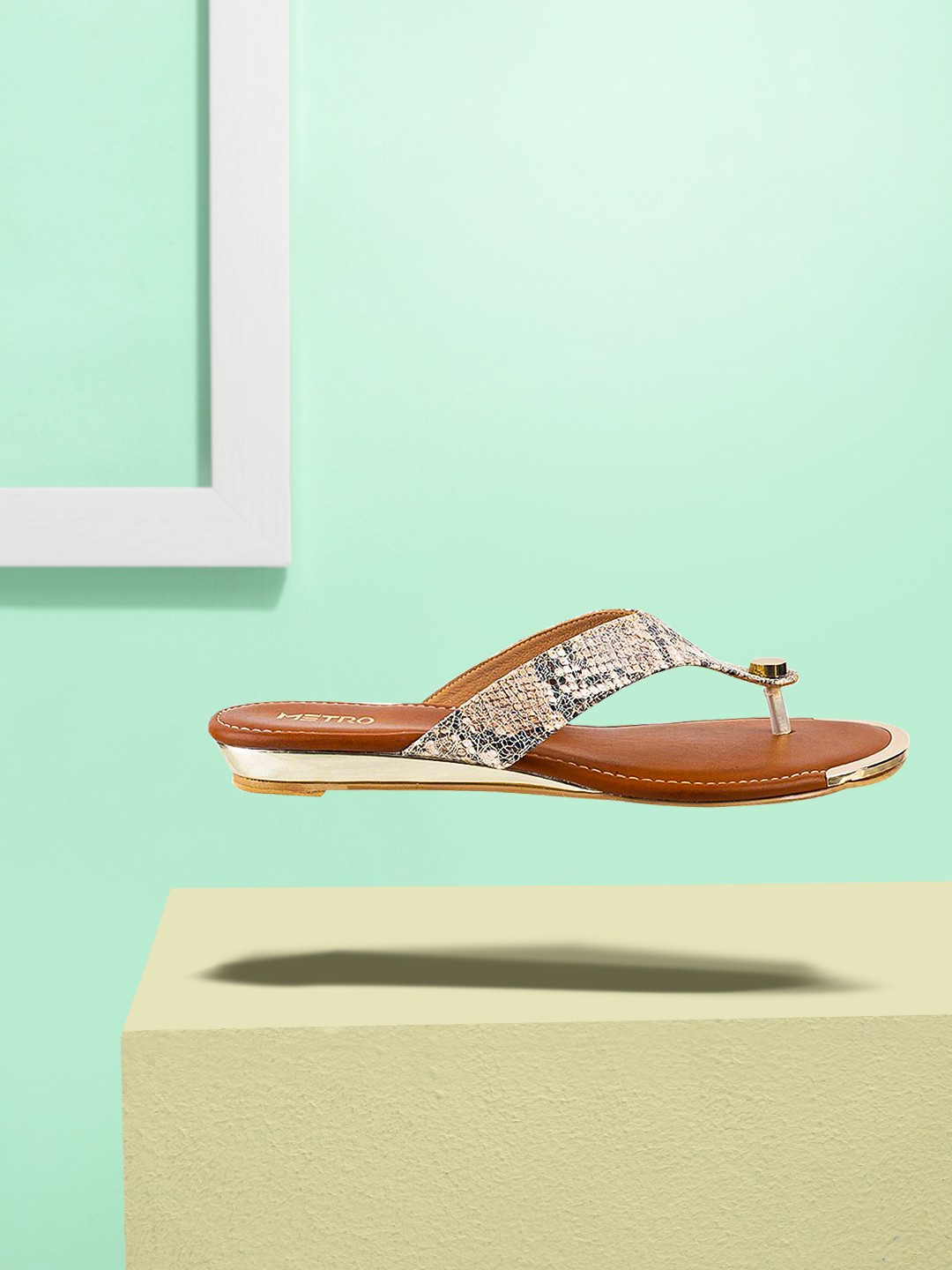 

Metro Women Beige & Black Printed Wedges