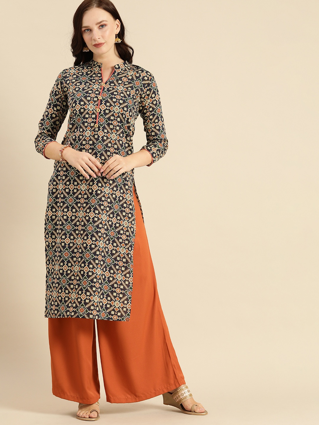 

Rajnandini Women Navy Blue & Rust Orange Geometric Printed Kurta