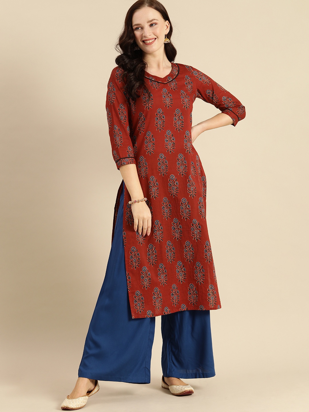 

Rajnandini Women Maroon & Teal Blue Floral Printed Kurta