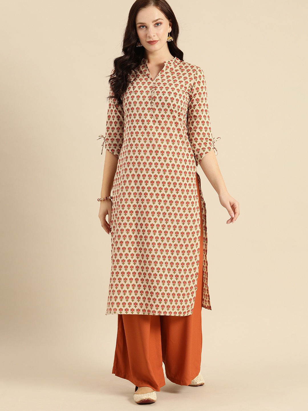 

Rajnandini Women Beige & Pink Floral Printed Kurta