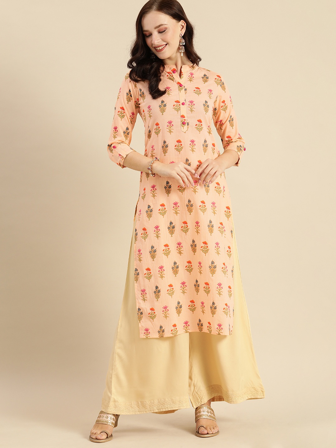 

Rajnandini Women Peach-Coloured & Pink Floral Printed Kurta