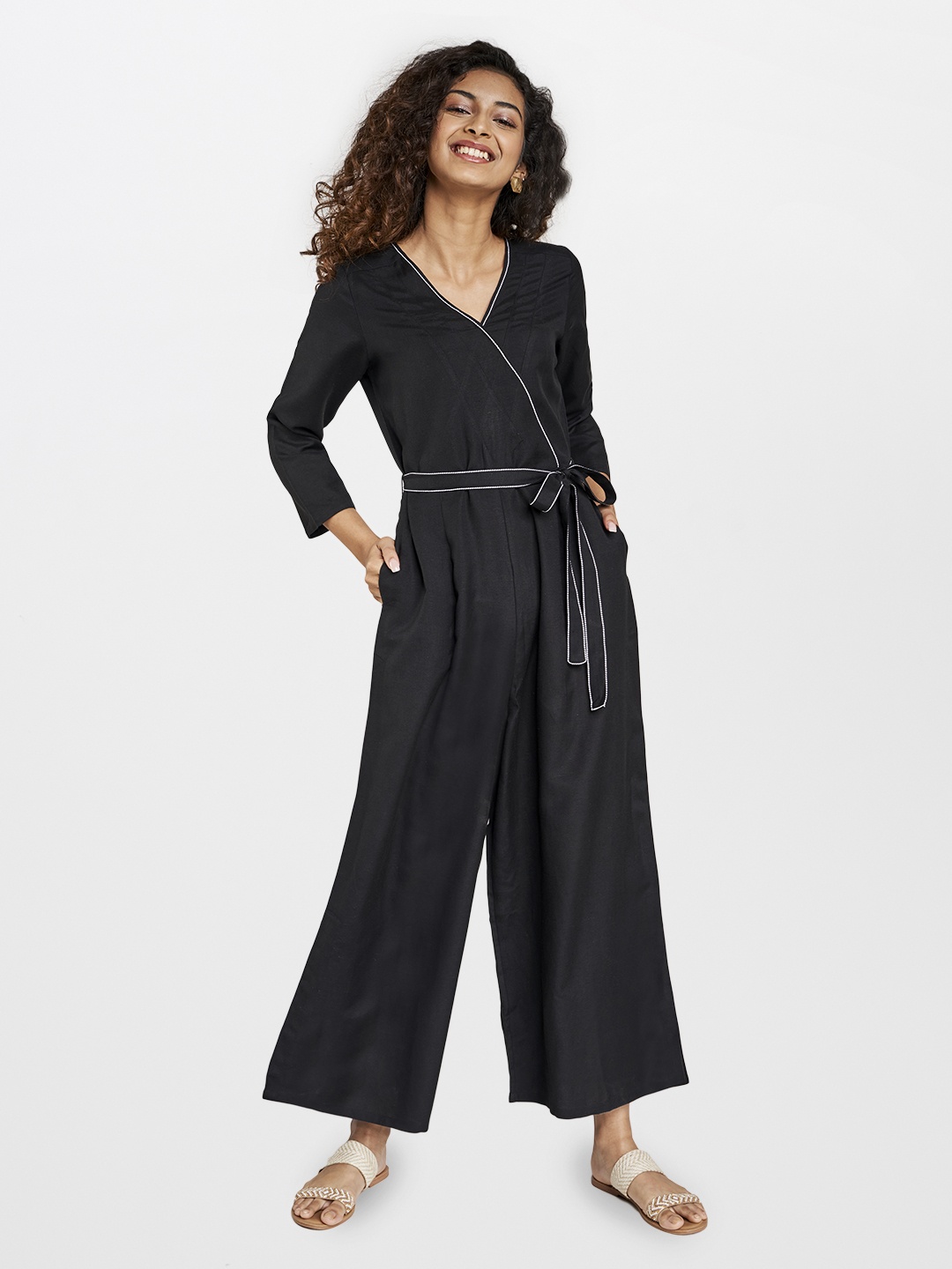 

Global Desi Women Black Solid Sustainable Basic Jumpsuit with Belt