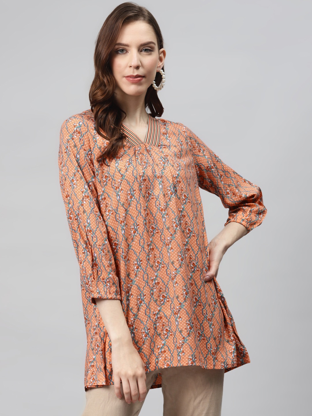 

Global Desi Eco Vero Women Orange & Blue Printed Tunic