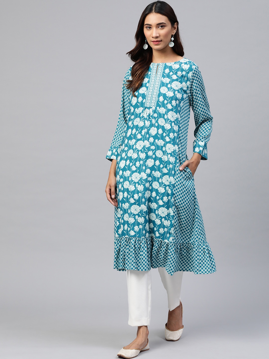 

Global Desi Women Teal Blue & Off-White Ethnic Motifs Printed Ecovero Keyhole Neck Kurta