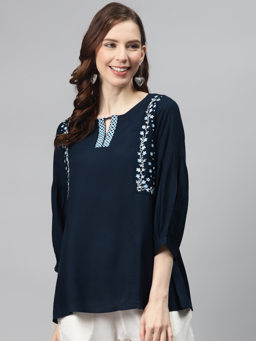 

Global Desi Women Ecovero Navy Blue Solid A-Line Top