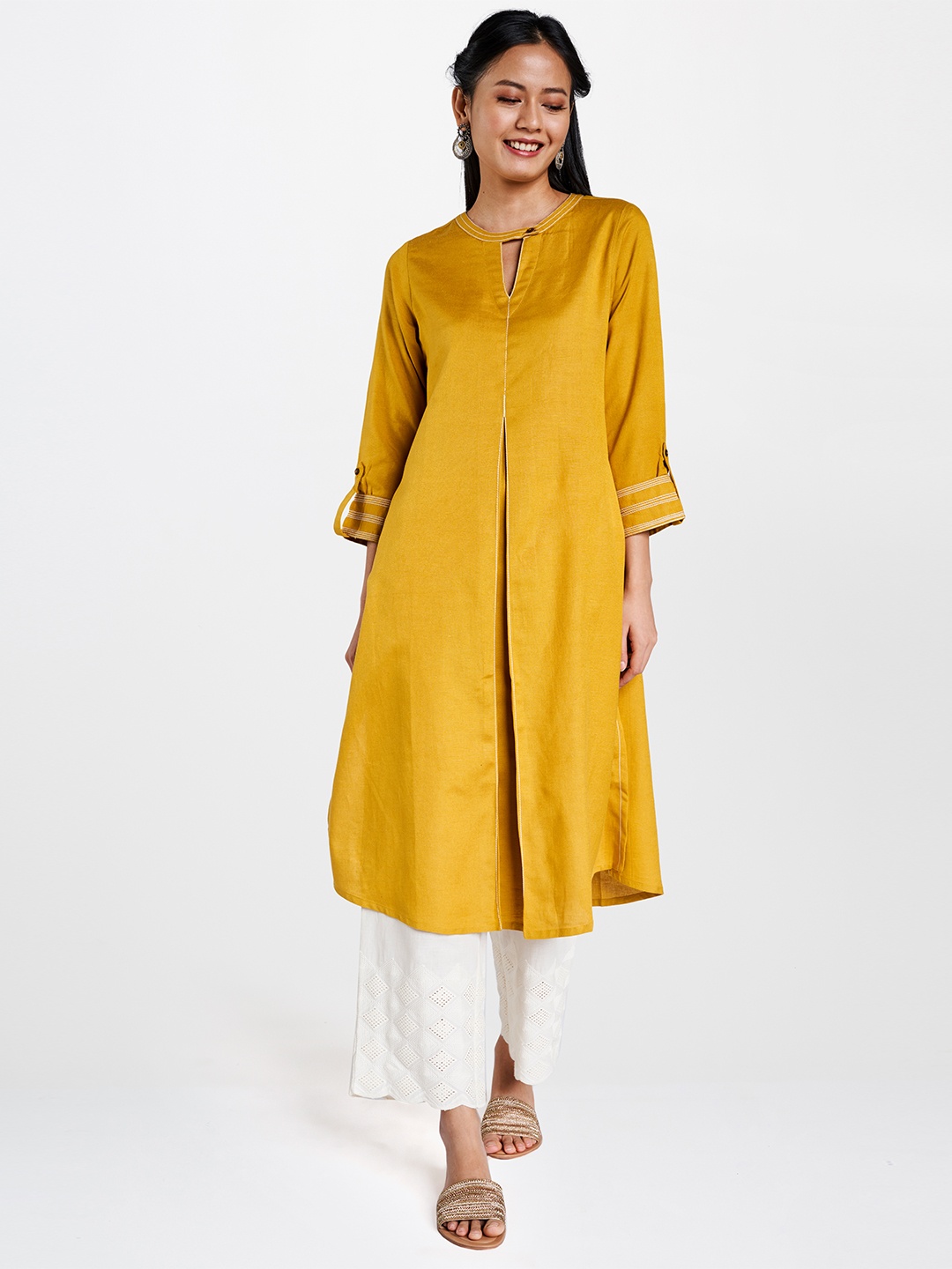 

Global Desi Women Mustard Yellow Solid A-Line Kurta