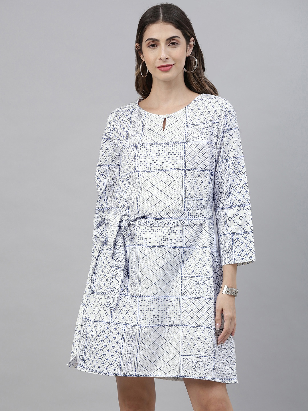 

Global Desi Women White & Navy Blue Printed A-Line Dress with Waist Tie-Ups