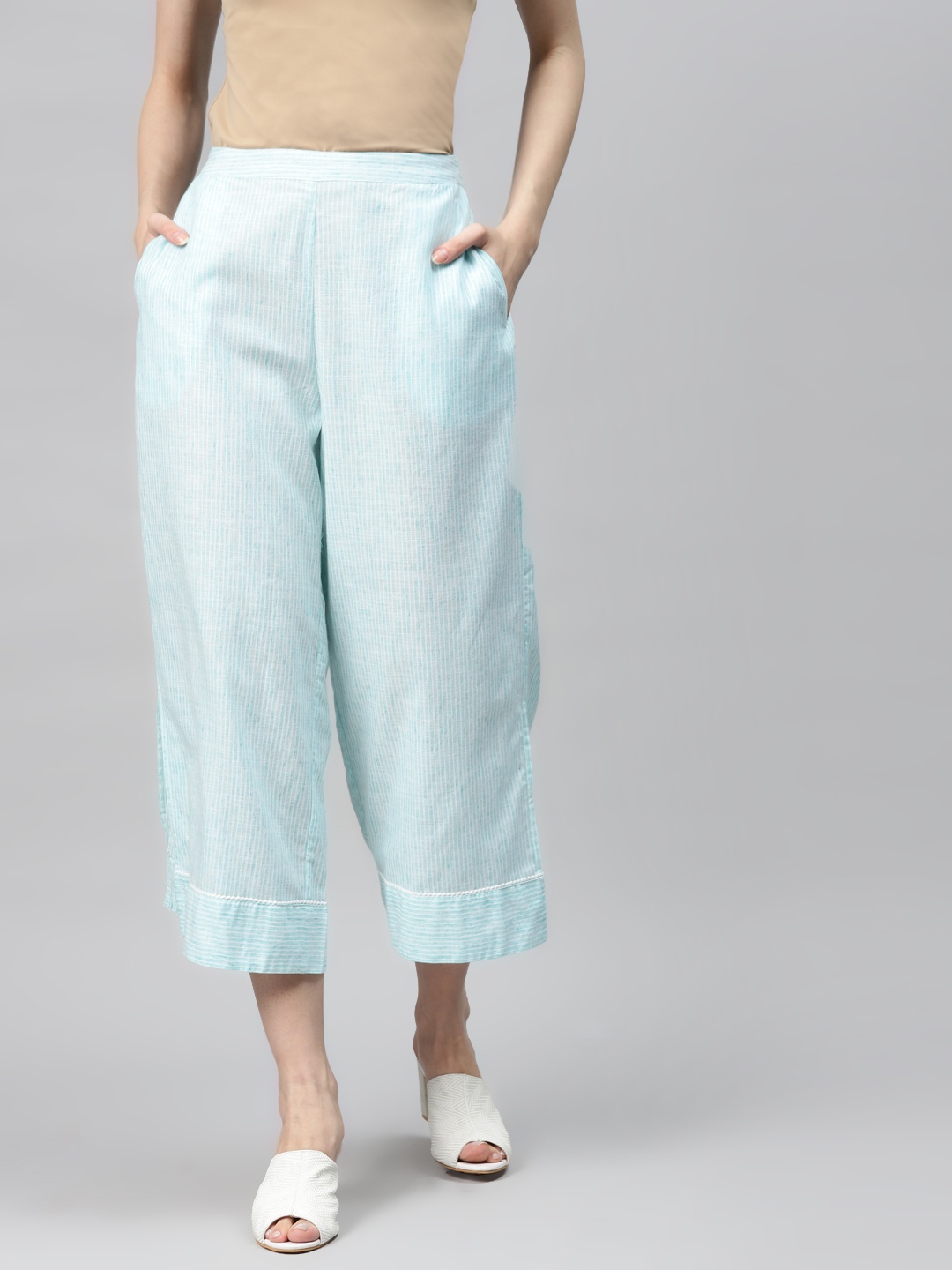 

Global Desi Women Blue & White Striped Straight Fit Cotton Crop Trousers