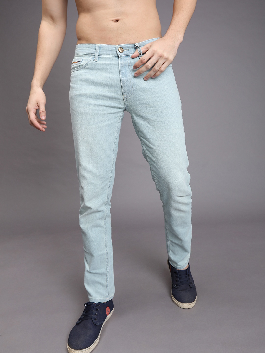 

The Indian Garage Co Men Blue Slim Fit Low-Rise Clean Look Stretchable Jeans