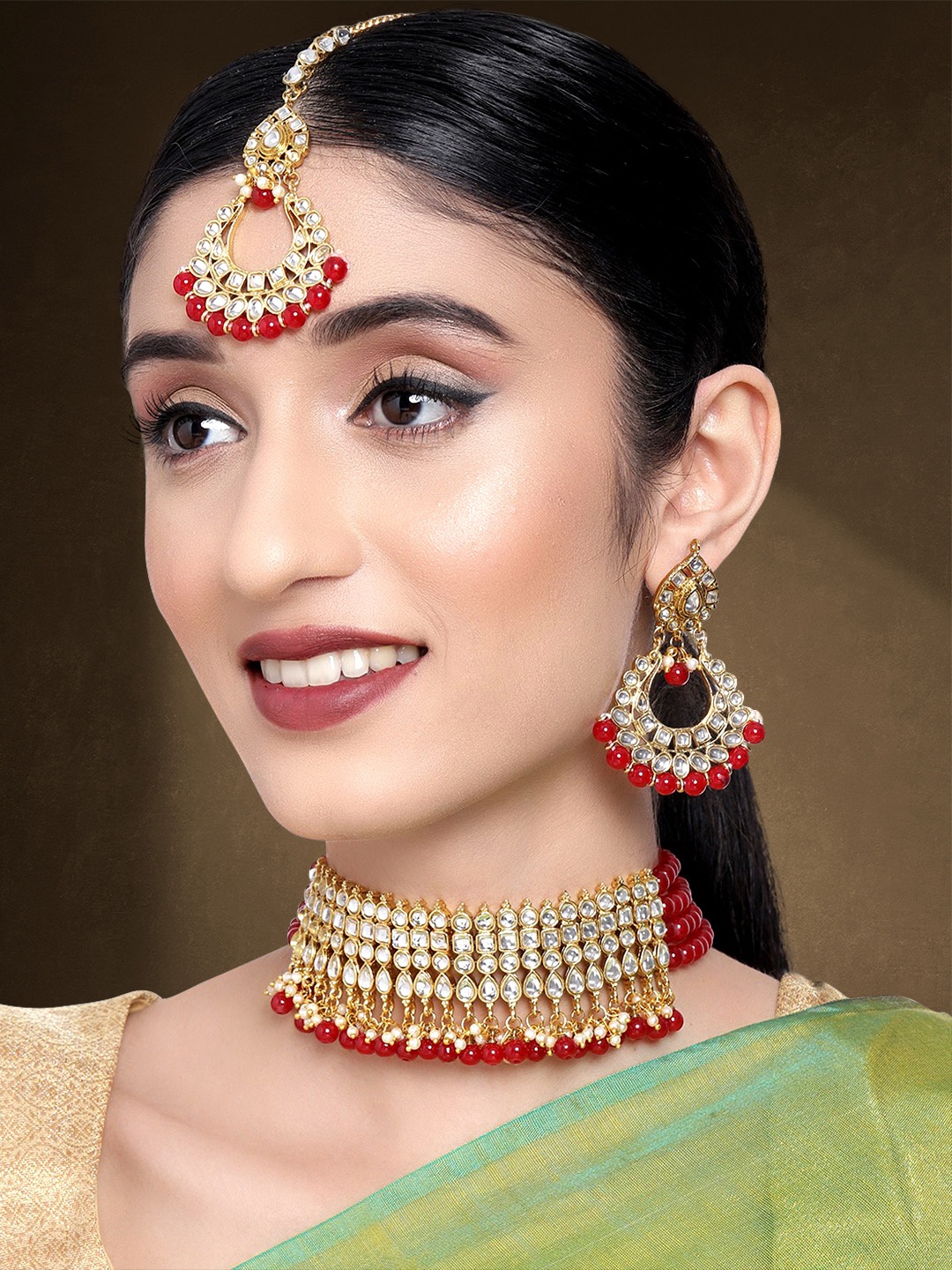 

Peora Gold Toned & Red Kundan Pearl Jewellery Set