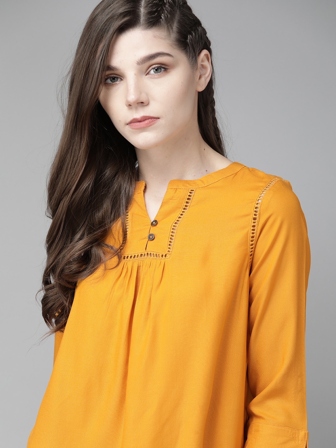 

The Roadster Lifestyle Co Women Ecovero Mustard Yellow Pleated Solid Regular Top