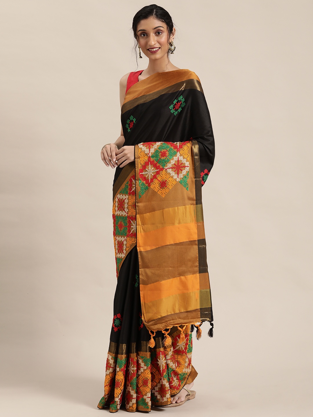 

Mitera Black & Yellow Ethnic Motifs Kutchi Embroidered Silk Cotton Saree
