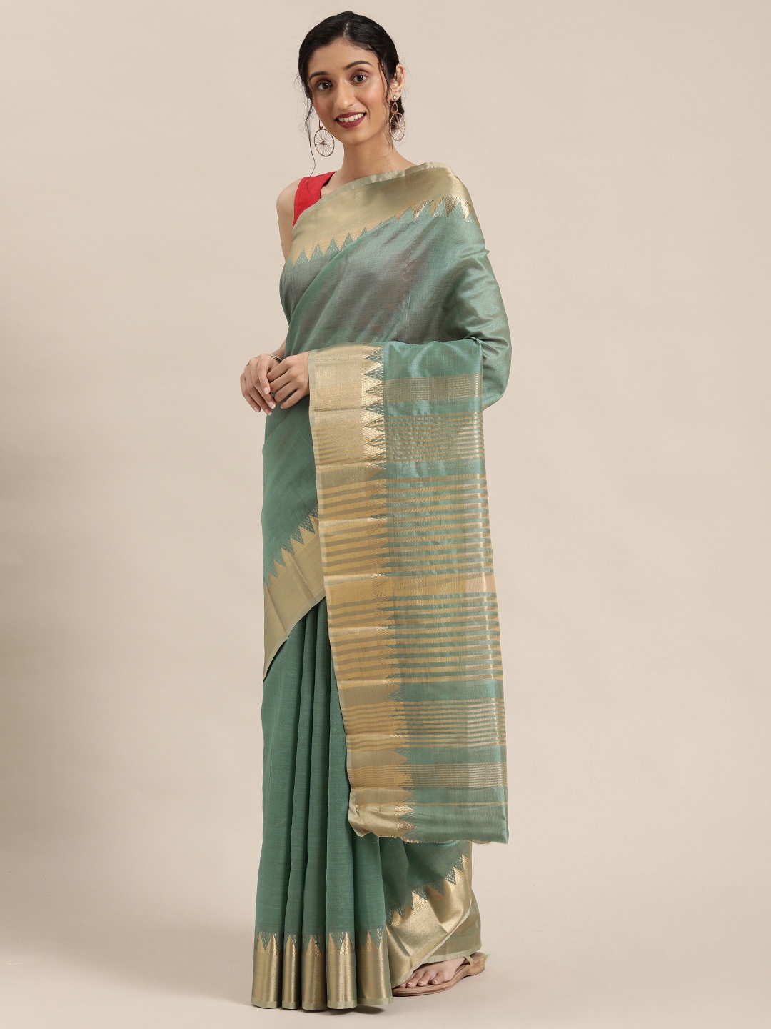 

KALINI Sea Green & Gold-Toned Solid Saree