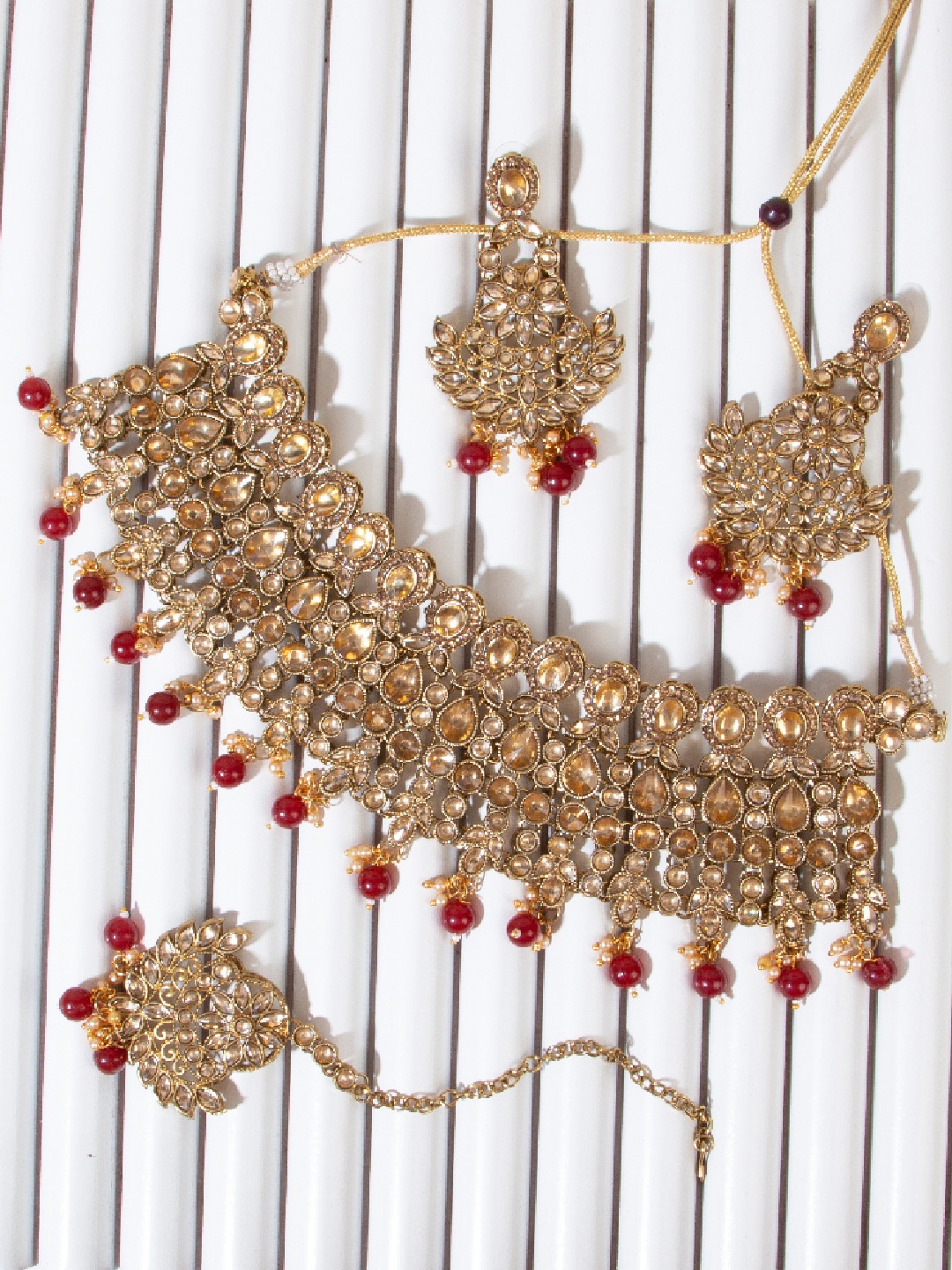 

AccessHer Maroon Gold-Plated AD Studded Jewellery Set