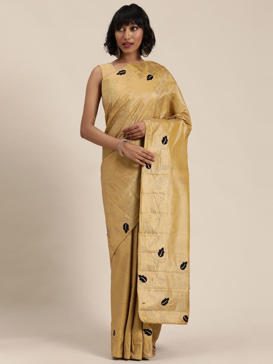 

Mitera Beige & Black Poly Silk Embellished Saree