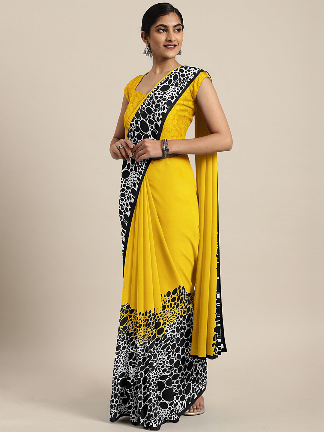 

KALINI Yellow & Black Pure Georgette Printed Saree