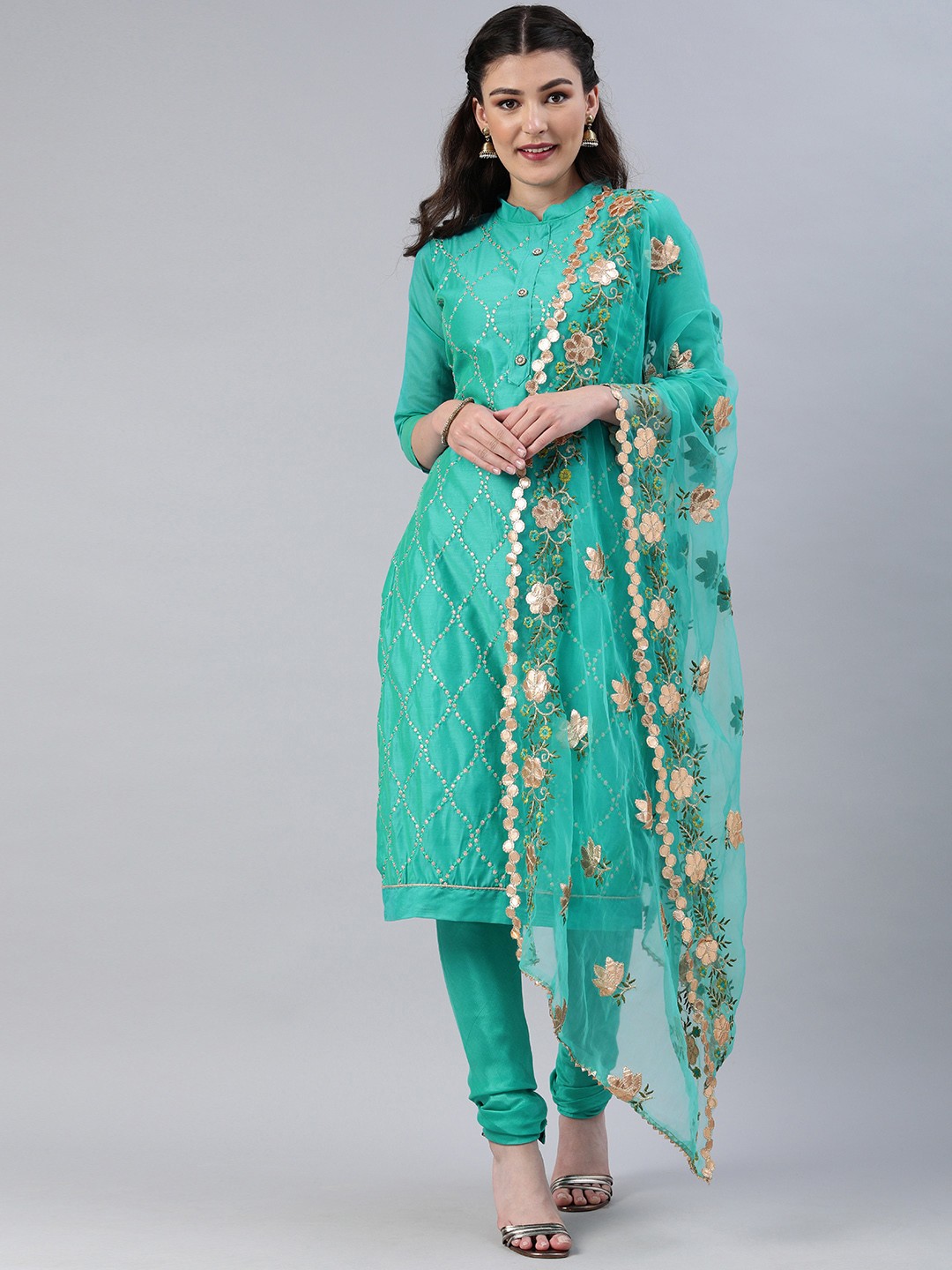 

Mitera Teal Green Silk Blend Unstitched Dress Material