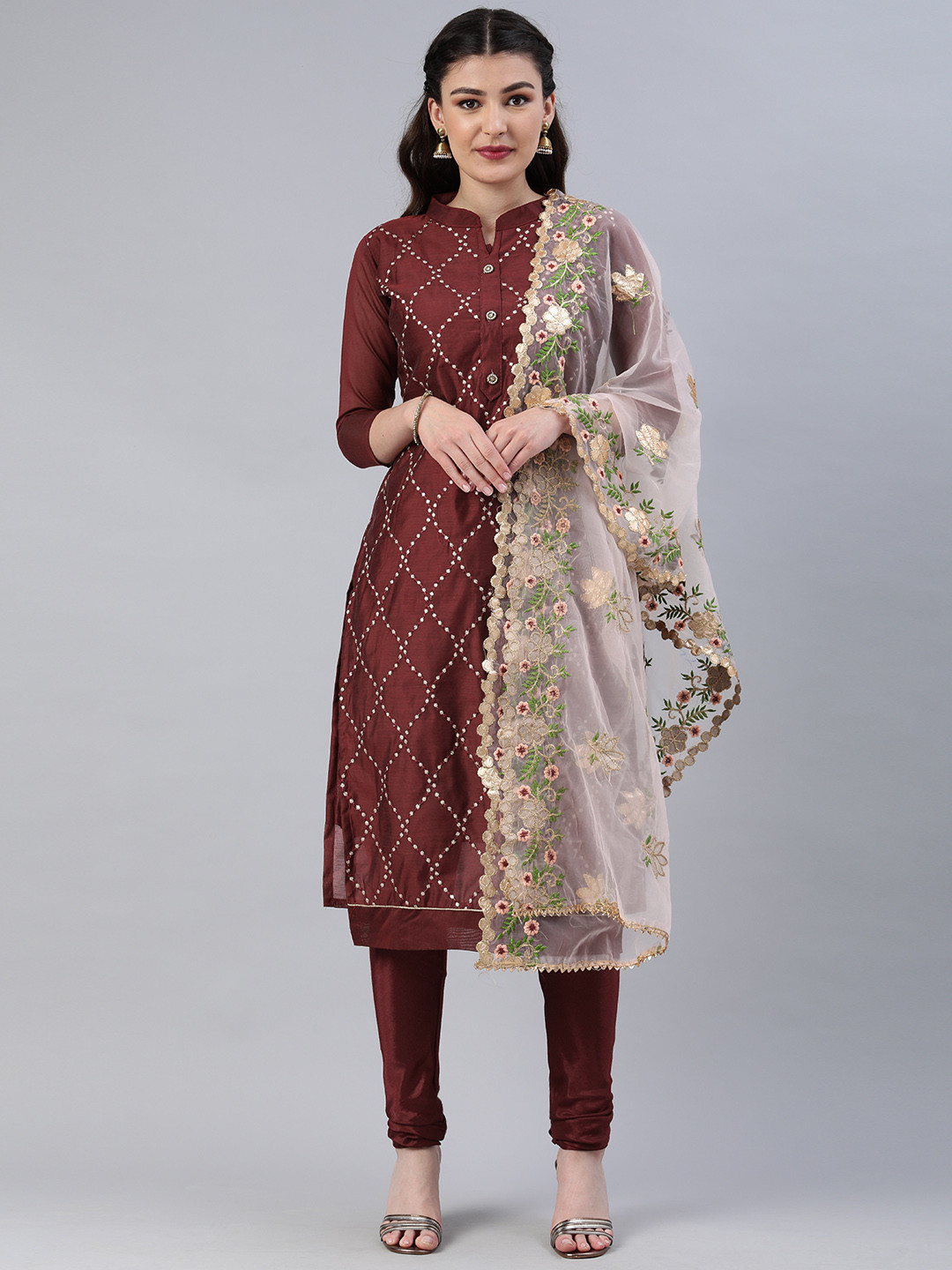 

Mitera Maroon Embroidered Unstitched Dress Material