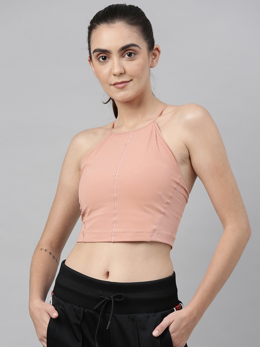 

Nike Women Rose Solid AS YOGA STMT CLN CROP TANK Styled Back Top
