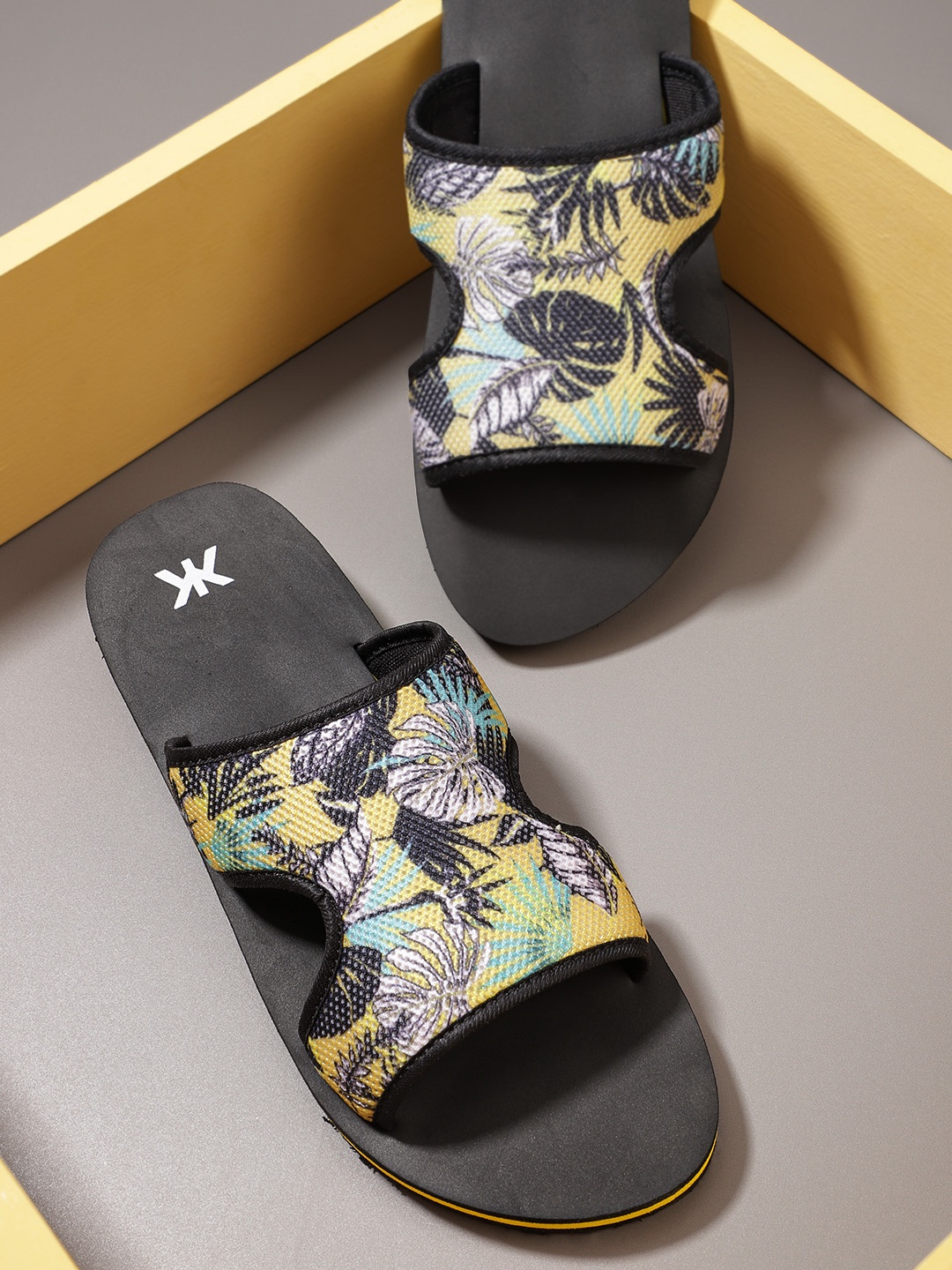 

Kook N Keech Men Mustard Yellow & Black Tropical Print Sliders with Cut Out Detail