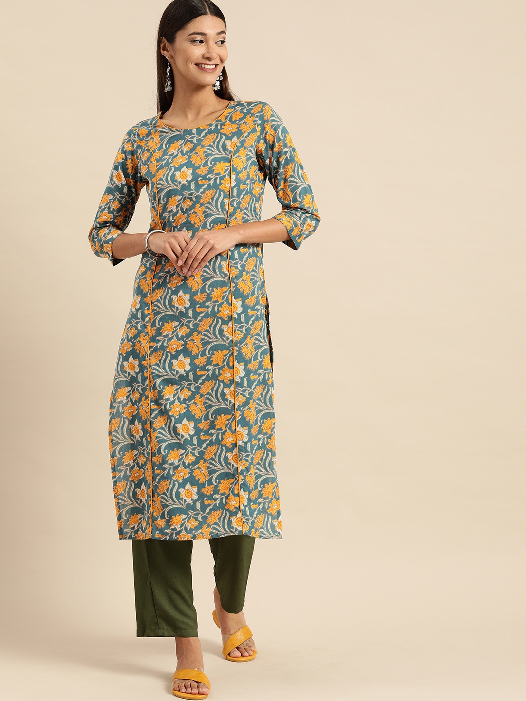 

Rajnandini Women Teal Blue & Yellow Floral Printed Pure Cambric Cotton Kurta