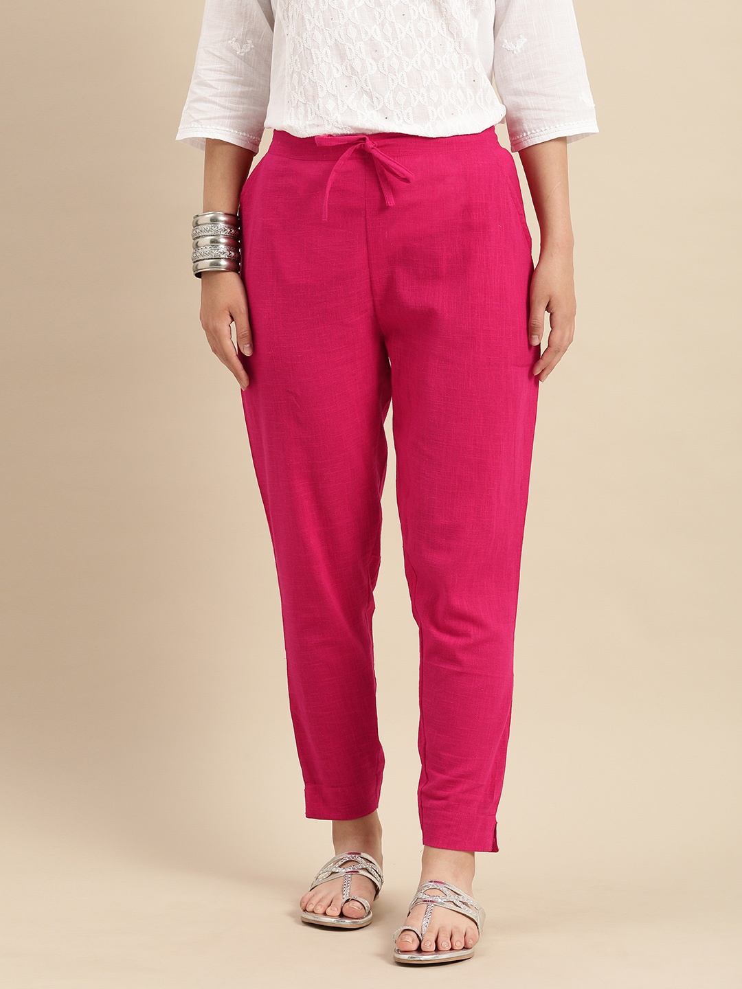 

Rajnandini Women Pink Relaxed Straight Leg Solid Regular Trousers