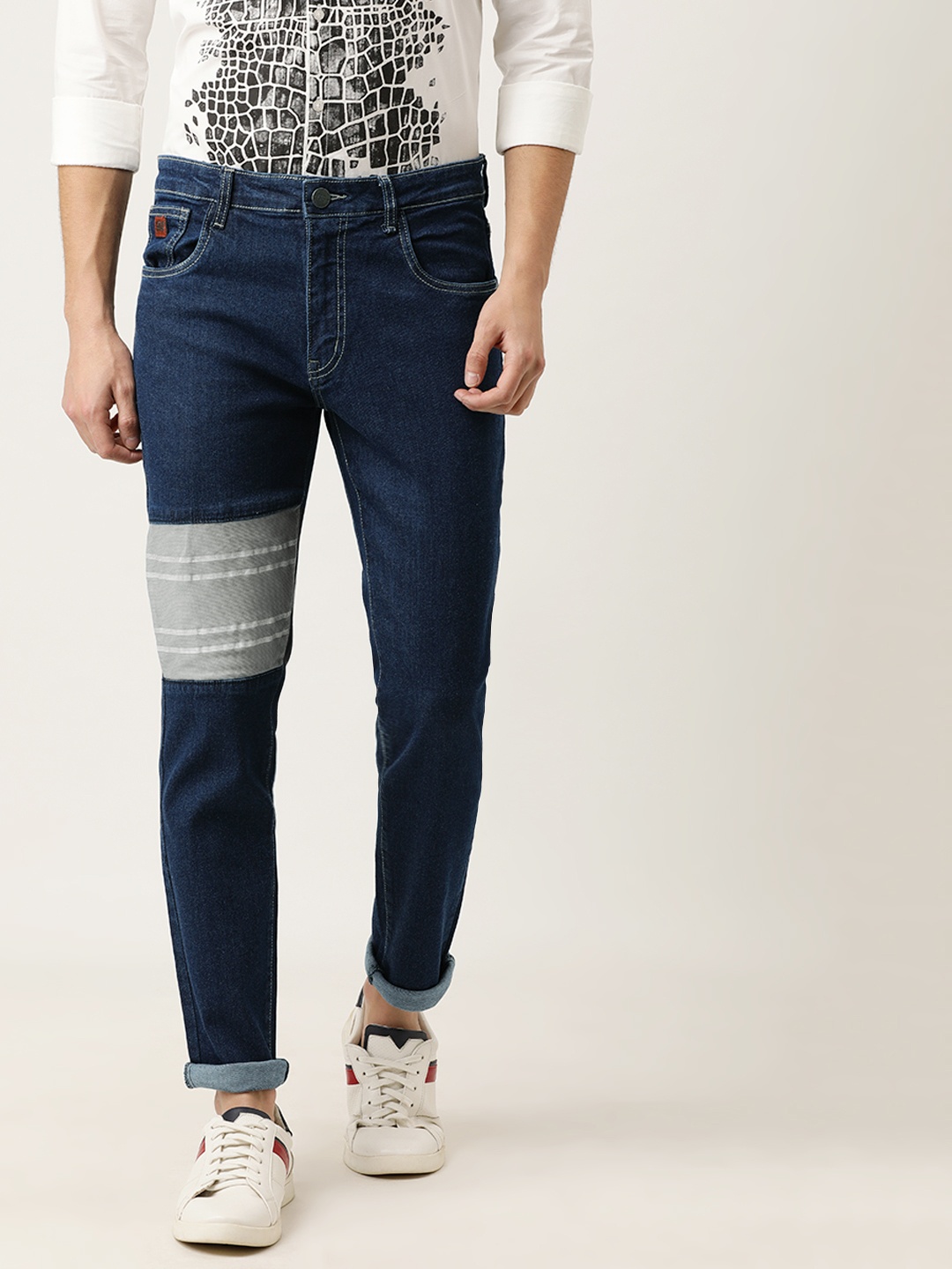 

Campus Sutra Men Blue Slim Fit Mid-Rise Clean Look Jeans with Patchwork