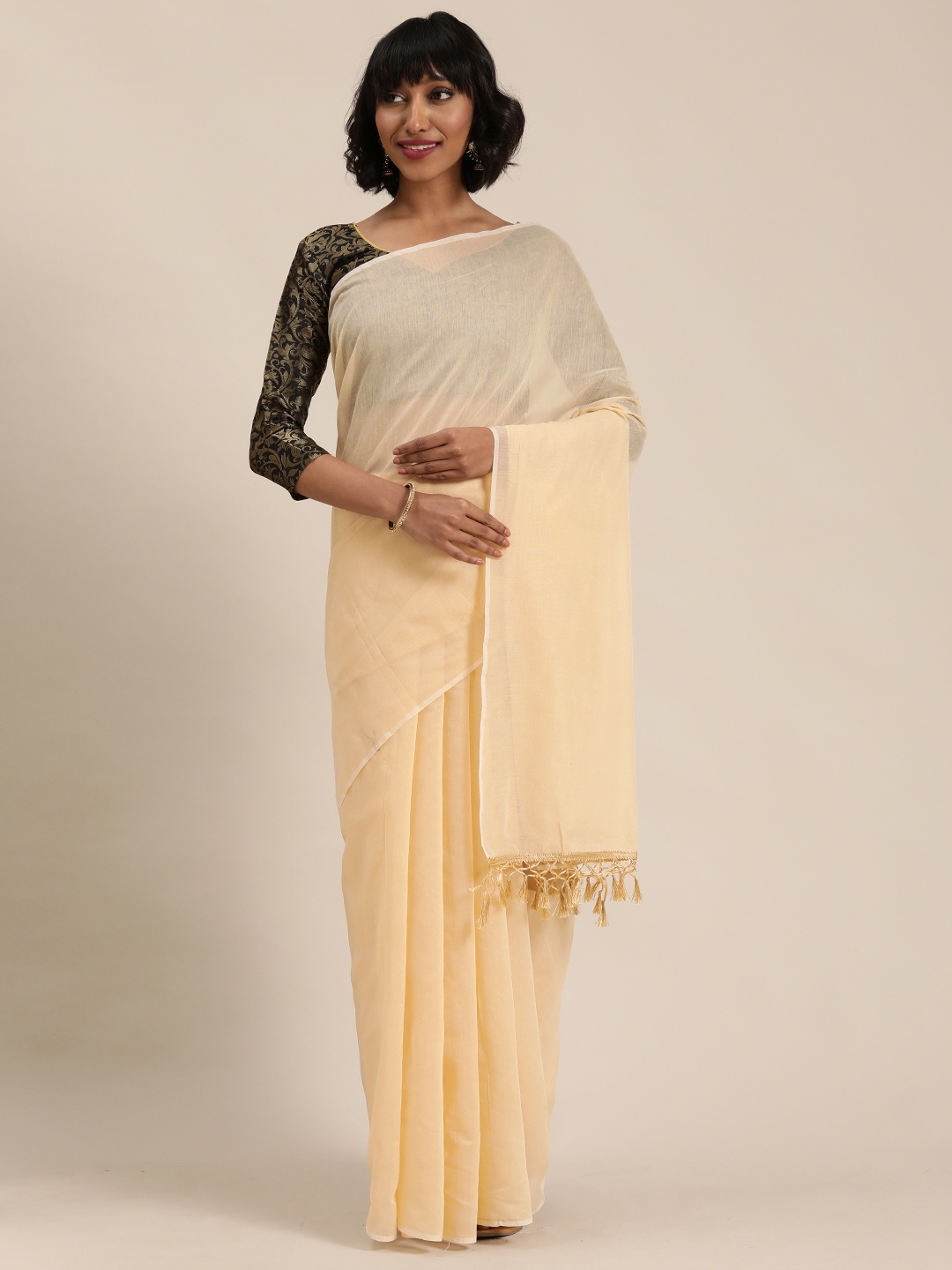 

Florence Cream-Coloured & Black Solid Saree