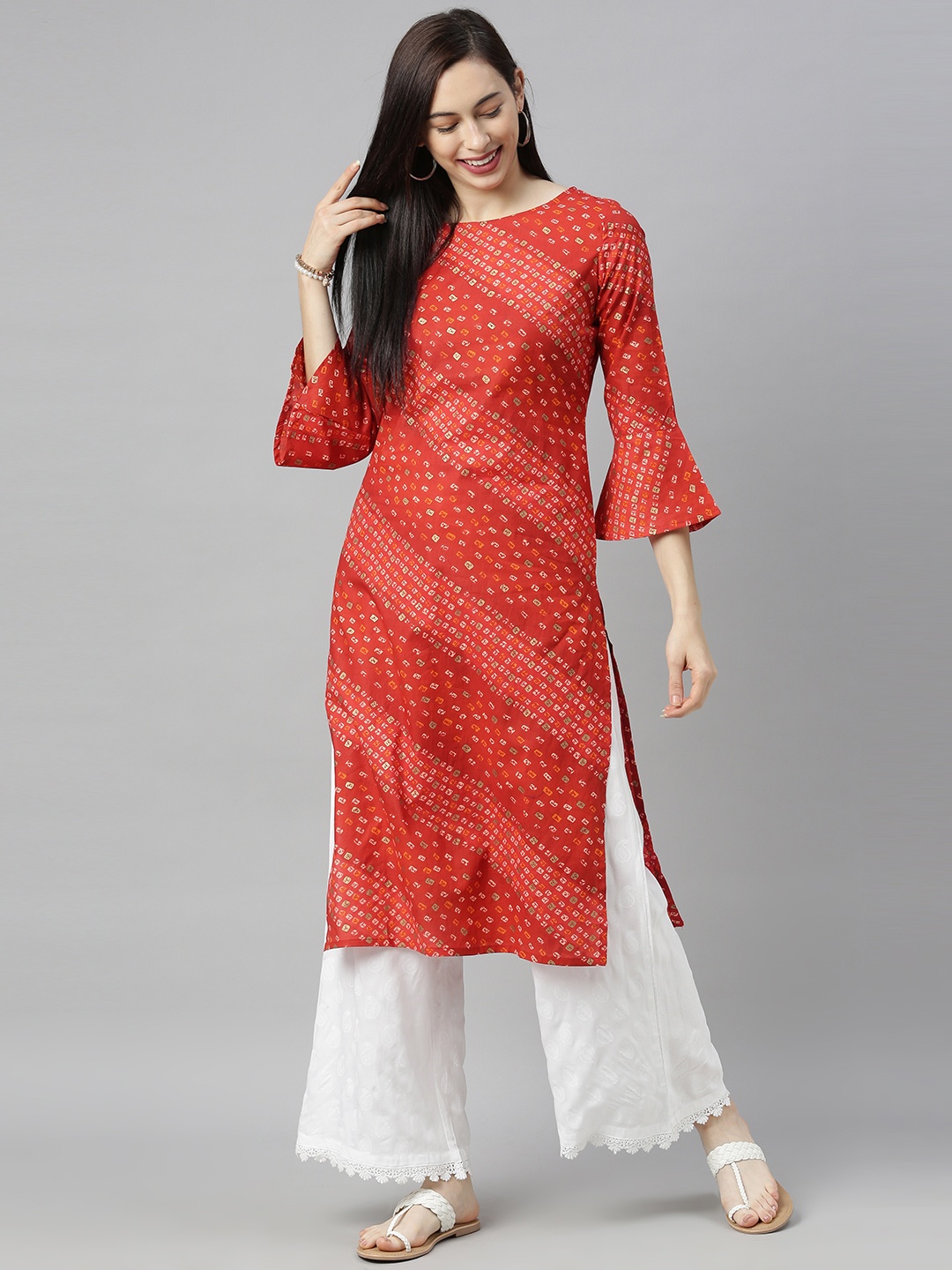 

Blissta Women Red & White Bandhani Printed Bell Sleeves Kurta