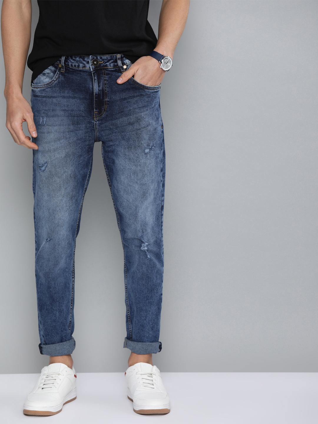 

Mast & Harbour Men Blue Carrot Fit Mid-Rise Low Distress Stretchable Jeans