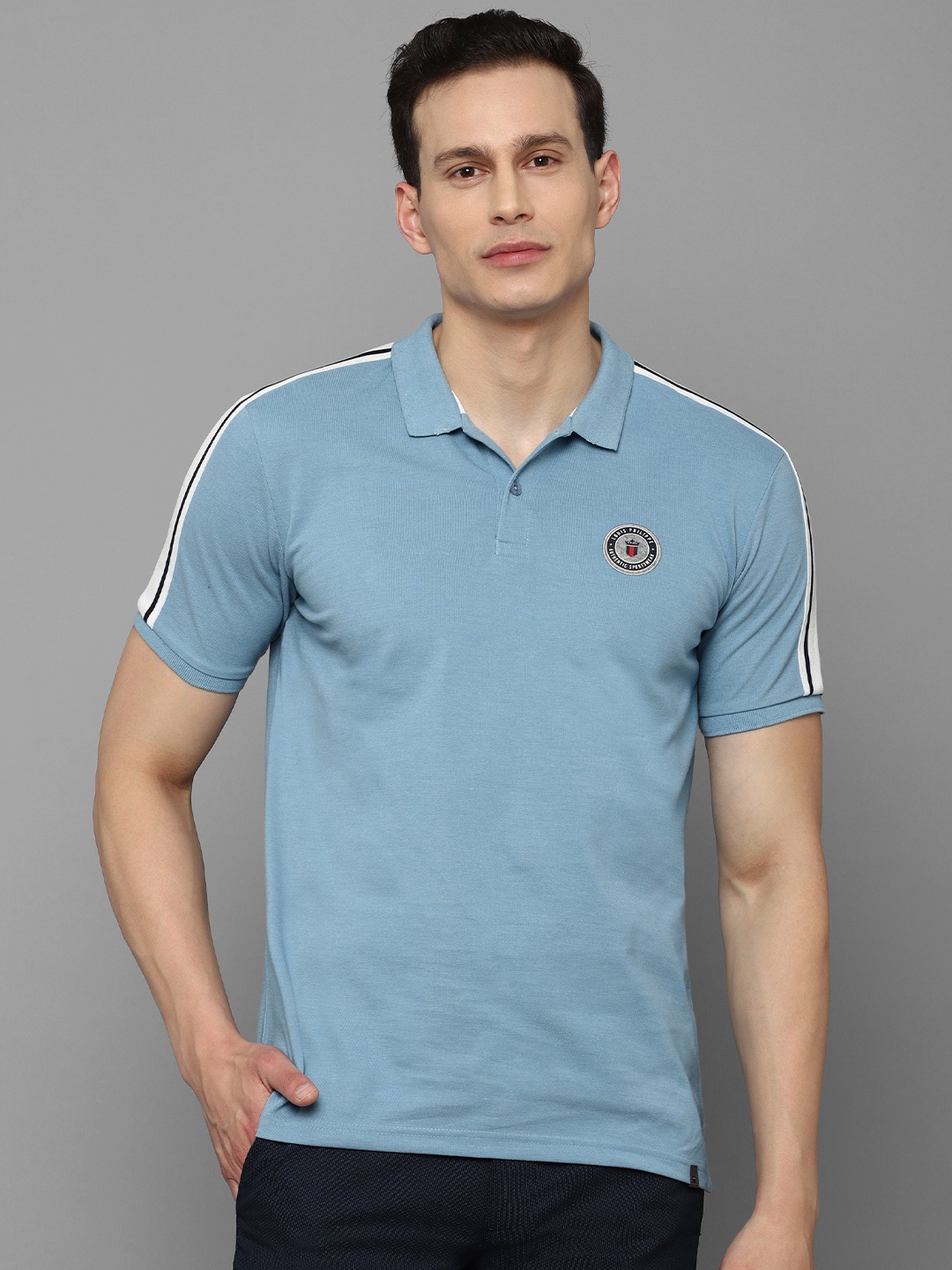 

Louis Philippe Sport Men Blue Solid Polo Collar T-shirt