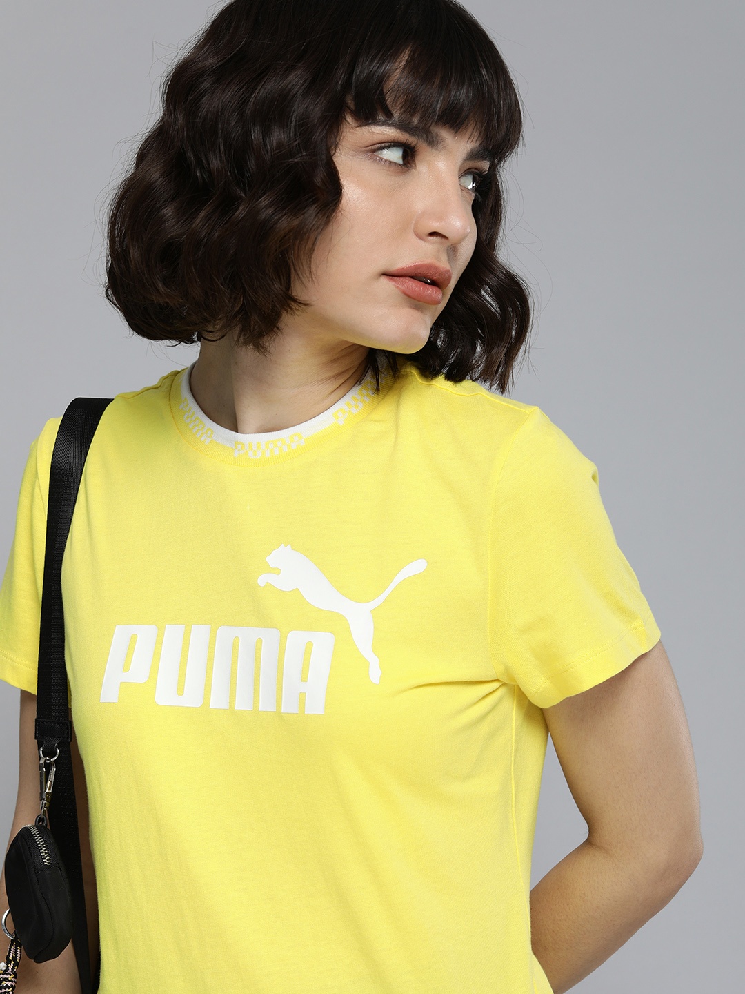 

Puma Women Yellow & White Brand Logo Printed Pure Cotton Casual T-shirt