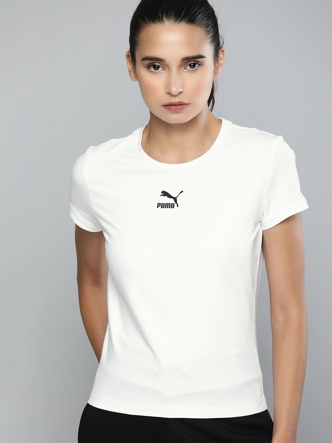 

Puma Women White Classics Fitted Solid Round Neck T-shirt with logo Print