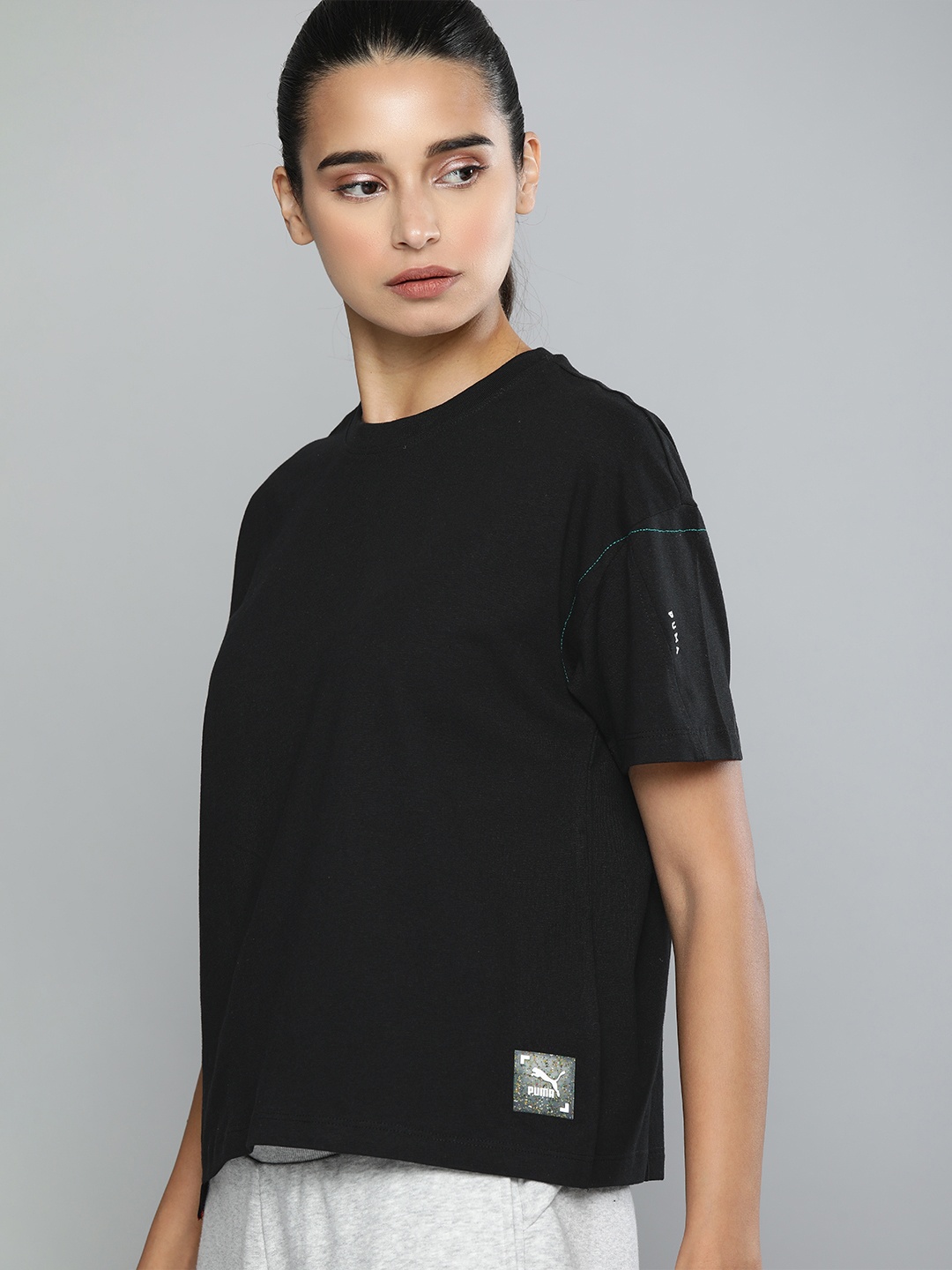 

Puma Women Black Relaxed Fit Solid Round Neck RE.GEN Pure Cotton T-shirt