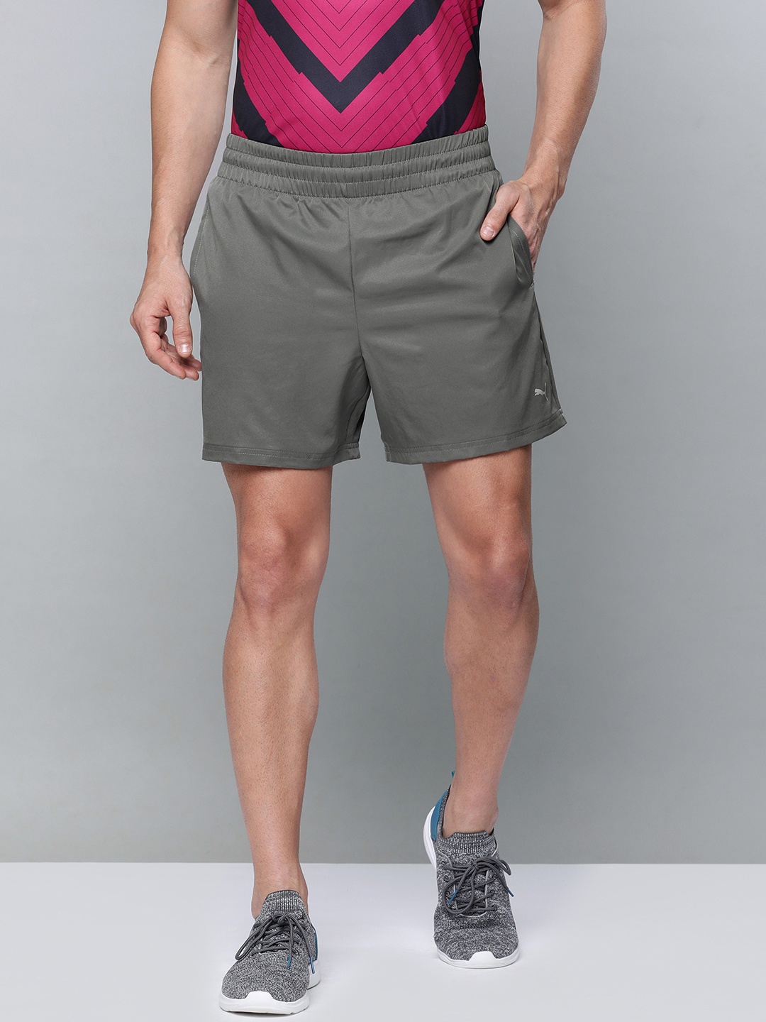 

Puma Men Grey Solid Performance Woven Outdoor Sports Shorts