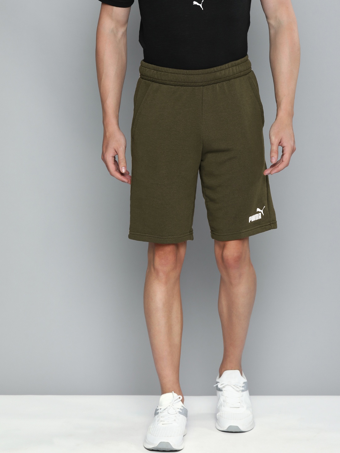 

Puma Men Olive Green Solid Regular Fit ESS 10" Sports Sustainable Shorts