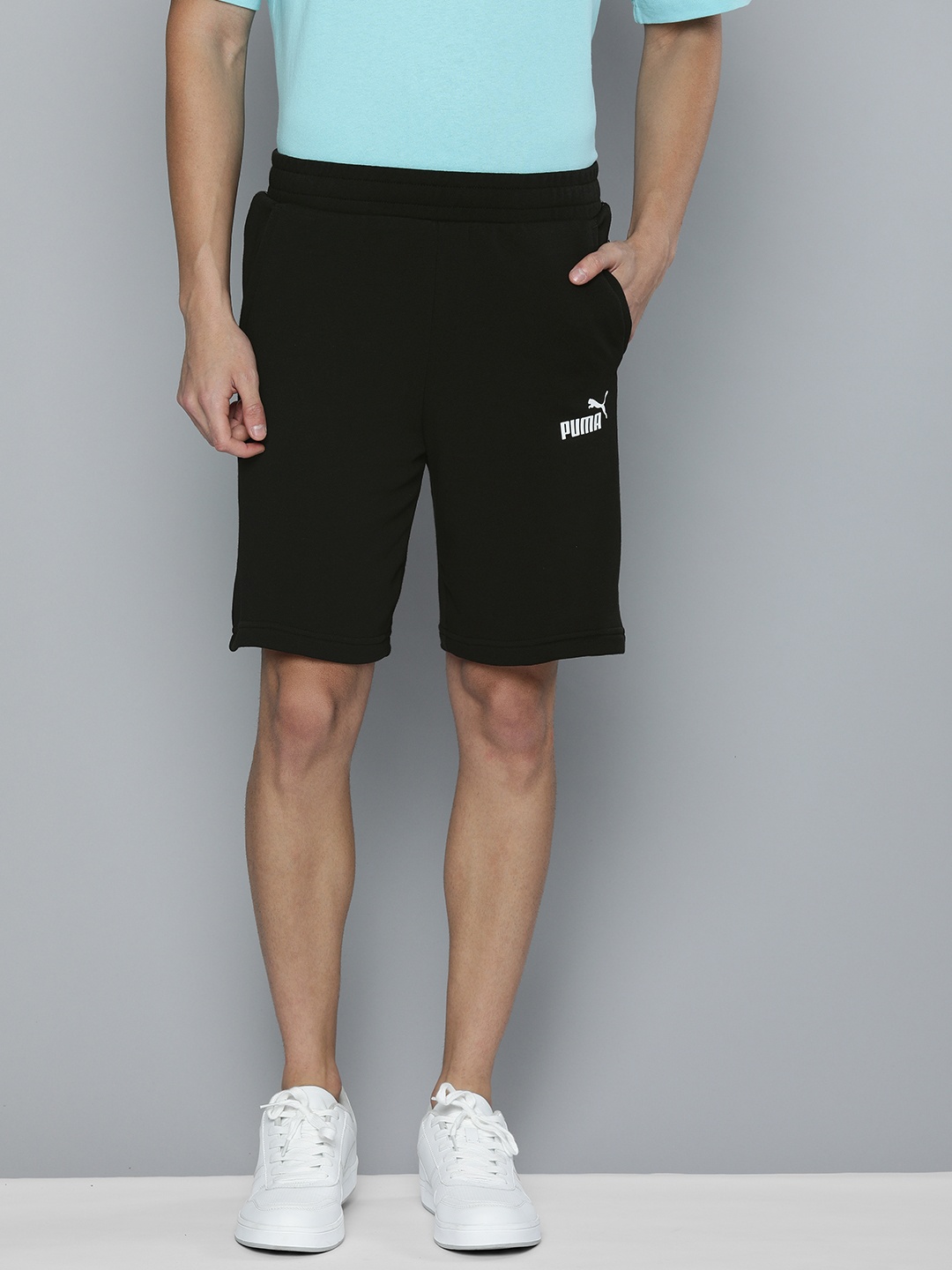 

Puma Men Black Solid Regular Fit AMPLIFIED 9" TR Regular Shorts