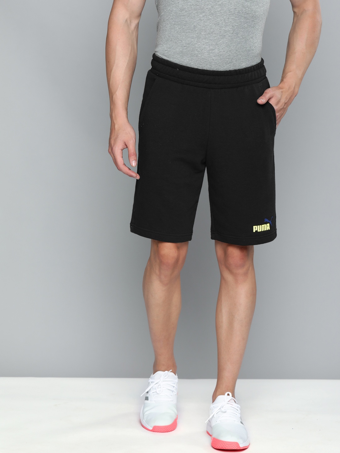 

Puma Men Black Solid Regular Fit ESS+ 2 Col 10" Sports Sustainable Shorts