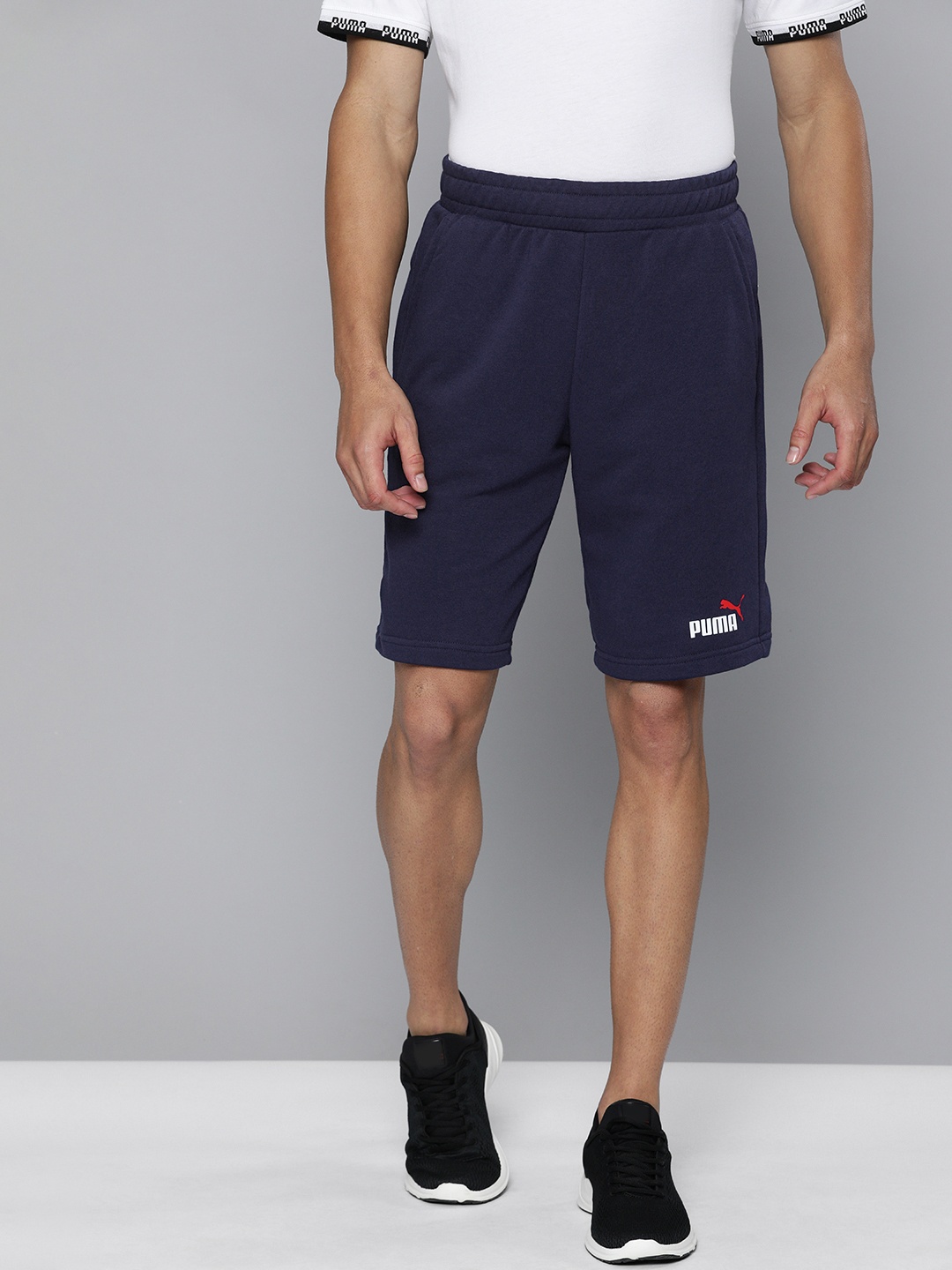 

Puma Men Navy Blue Solid ESS+ 2 Col Regular Fit Shorts