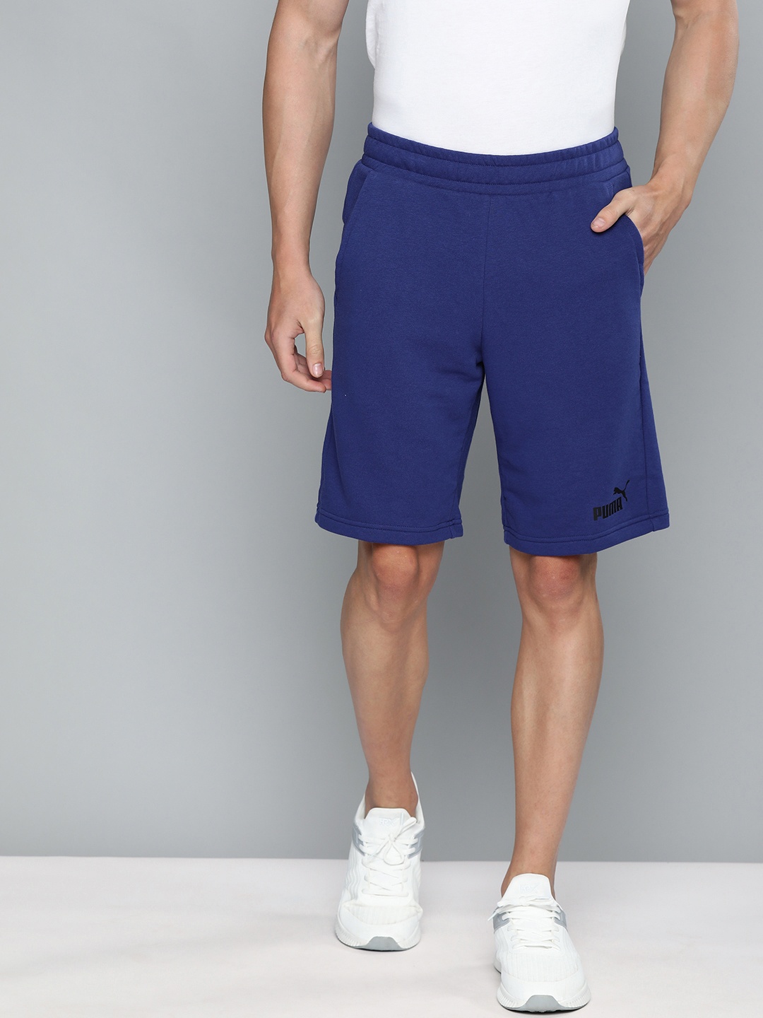 

Puma Men Navy Blue Solid Regular Fit ESS 10"Sports Shorts