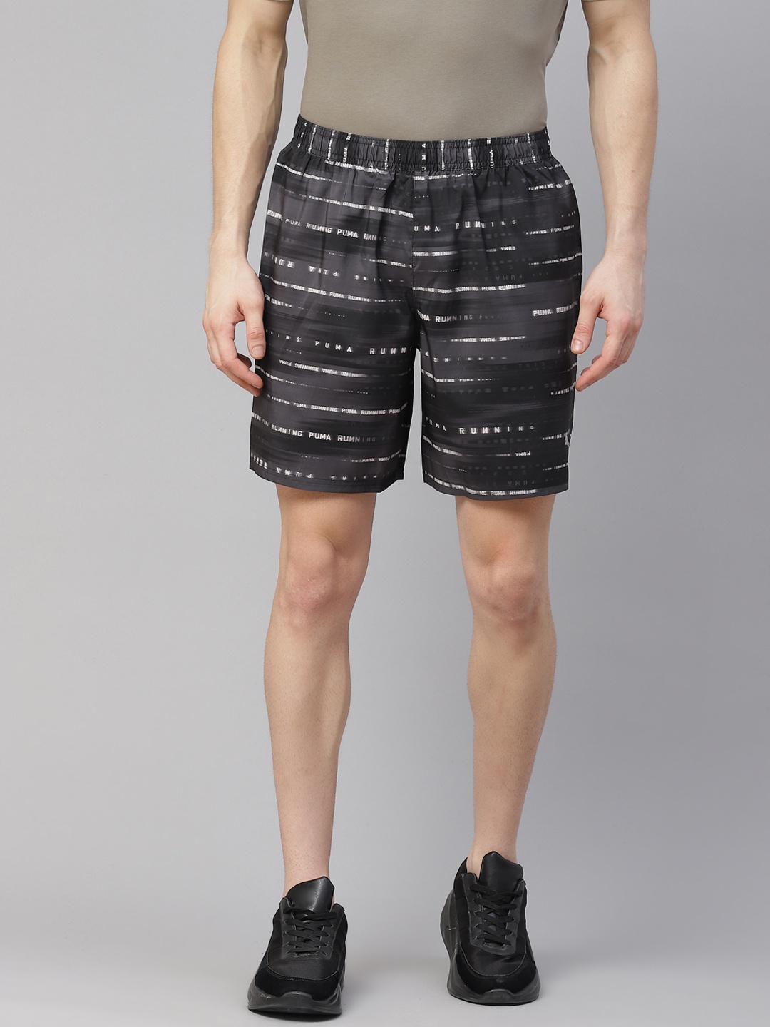 

Puma Men Black & White Solid Run Graphic Knit 9" Shorts